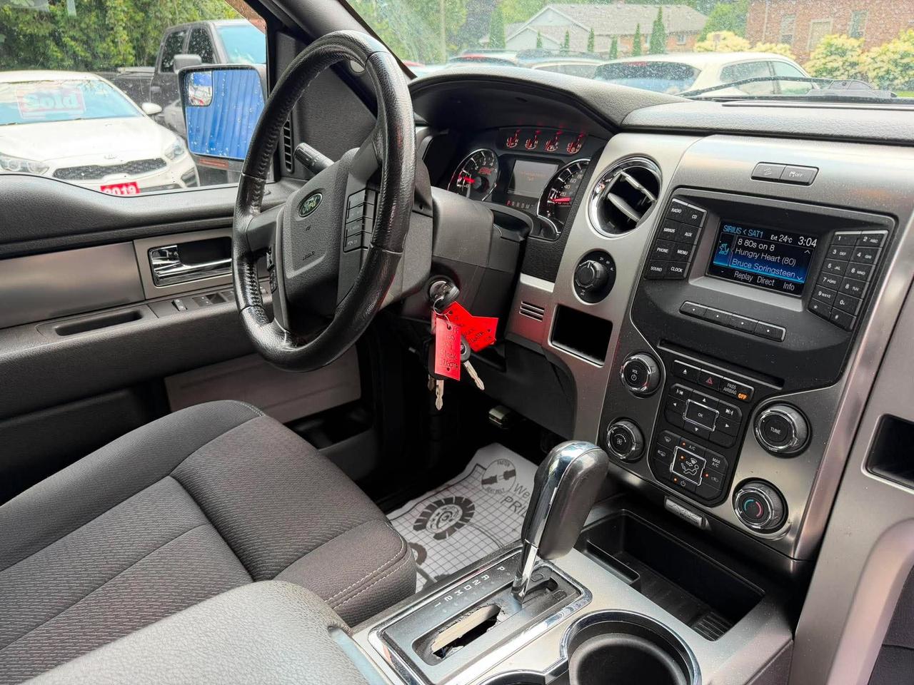 2014 Ford F-150 4WD SUPERCREW 145" FX4 Photo
