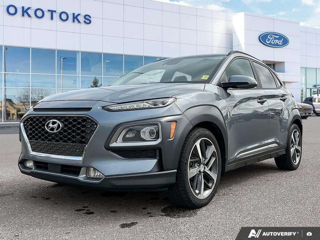 <p>This <strong>2020 Hyundai Kona Ultimate</strong> finished in a sleek medium gray has spent its life locally registered in Alberta as a well-cared-for personal vehicle. Previously owned by a single local owner who recently upgraded to something newer and bigger, this compact crossover comes with a heavily documented maintenance background and is ready for its next home with complete peace of mind.</p><p>Our factory-trained technicians completed a thorough mechanical fitness assessment and service work on July 29, 2026, to ensure complete <strong>peace of mind</strong> before hitting the lot. The service work completed includes:</p><ul><li><p>Performed a complete engine oil and filter change using quality synthetic oil.</p></li><li><p>Replaced both the engine air filter and cabin air filter with fresh elements.</p></li><li><p>Replaced all three wiper blades for clear seasonal visibility.</p></li><li><p>Installed a brand-new professional front windshield.</p></li><li><p>Verified robust brake health with front pads at 7 to 8mm and rear pads at 6 to 7mm, alongside healthy 8/32 tire tread depth.</p></li></ul><p>According to the <strong>Carfax Canada</strong> vehicle history report, this Kona carries a clean history with <strong>one single owner</strong> and <strong>zero reported accidents</strong> or damage records. It maintains a normal Alberta registration status backed by 14 detailed service entries showing regular professional upkeep.</p><ul><li><p><strong>All-Wheel Drive (AWD)</strong>: Delivers reliable traction, stability, and handling confidence through changing Canadian seasons and road conditions.</p></li><li><p><strong>Compact SUV Stance</strong>: Provides an elevated driving position and nimble maneuverability that makes city parking and daily commuting effortless.</p></li><li><p><strong>Versatile Cargo Layout</strong>: Features flexible rear folding seats to accommodate groceries, luggage, or gear that matters for weekend getaways.</p></li><li><p><strong>Fuel-Efficient 4-Cylinder Engine</strong>: Balances everyday driving performance with smart fuel economy to keep your running costs manageable.</p></li><li><p><strong>Touchscreen Infotainment System</strong>: Keeps you seamlessly connected to navigation, media, and hands-free communication on the move.</p></li><li><p><strong>Advanced Safety Tech</strong>: Offers intuitive driver-assistance features designed to enhance awareness and security on every trip.</p></li></ul><p>Text or Call us today at Okotoks Ford Lincoln for a personalized video walk-around or to book your test drive of this vehicle.</p>