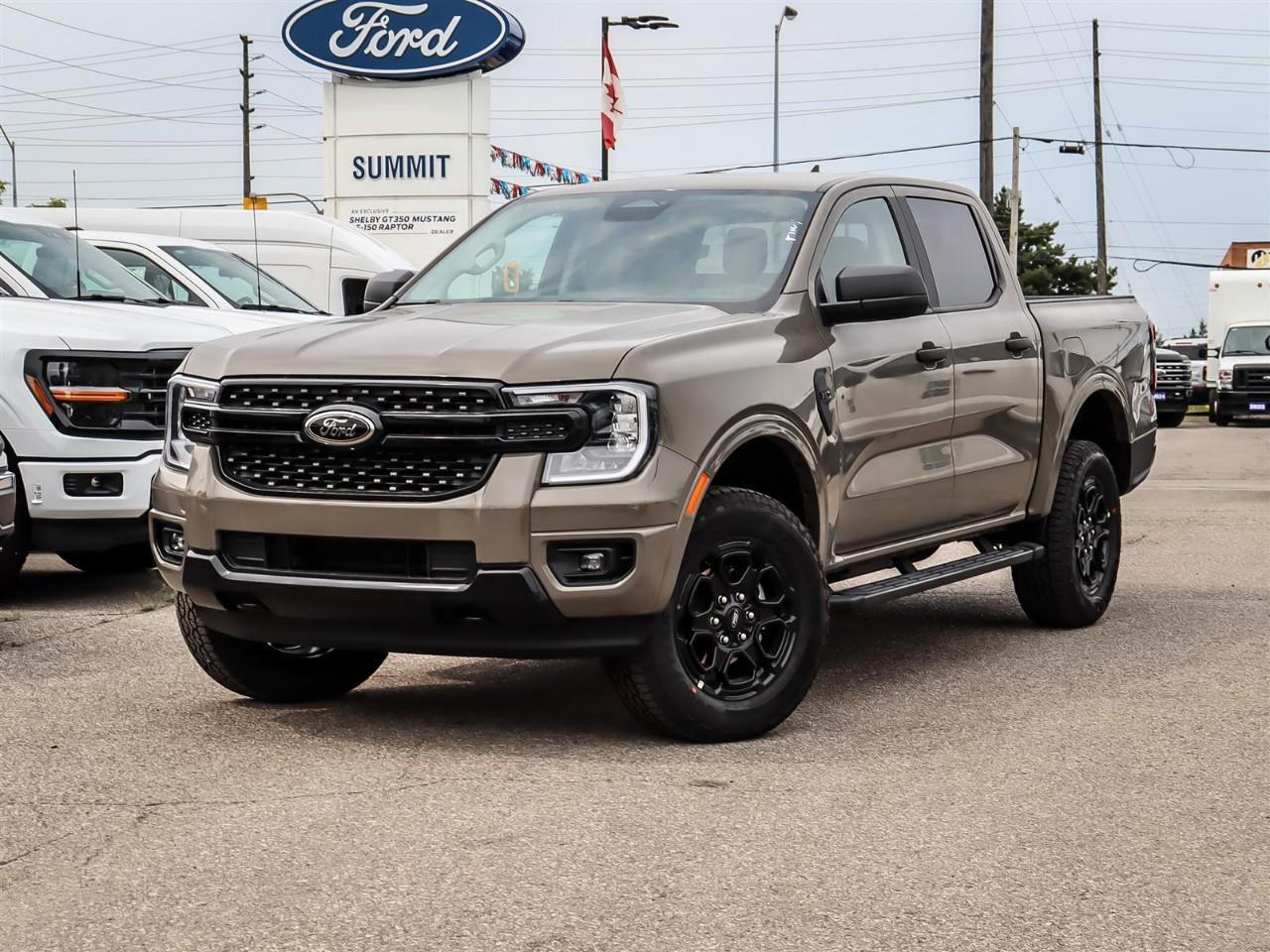 <p>For those in search of a powerful and stylish truck that excels both on and off the road, the 2026 Ford Ranger XLT 4WD SuperCrew is a top contender in its class. This new gray beauty boasts a robust 4×4 drivetrain, providing exceptional handling and stability.</p><p>The exterior design of this Ford Ranger is complemented by its Black Appearance Package, featuring a Black Centre Bar & Surround Grille, 18" Black Painted and Machined Aluminum Wheels, and all-terrain tires. The black painted lower valance and body-color painted front fascia enhance its rugged yet modern look, further emphasized by the Black Rear Bumper and Black Running Boards. Inside, the truck offers a sophisticated black interior exuding comfort and luxury with a Leatherette Steering Wheel and Leather Gear Shifter Material.</p><p>Technology enthusiasts will appreciate the cutting-edge features including a 12" Centre Display and smart device integration, ensuring a connected drive. The dual-zone electronic temperature control and heated power glass sideview mirrors guarantee comfort in any weather, while the power sliding rear window provides additional convenience. Safety and driver assistance features such as lane assist, parking sensors, and a backup camera are integral, making every journey secure. Additionally, drive modes in the electronic 10-speed automatic transmission allow customization depending on the terrain, with options like ECO, sport, tow/haul, and slippery.</p><p>This truck is designed for adventurers, families, and professionals who need a reliable yet attractive vehicle for both daily commutes and weekend getaways. With features like remote start, keyless entry, and a state-of-the-art navigation system, the 2026 Ford Ranger XLT is as versatile as it is dynamic. Feel the difference with the impressive ENGINE: 2.7L ECOBOOST V6, complete with auto start-stop technology. For further information on how this extraordinary truck meets your needs, reach out to Summit Ford today.</p>