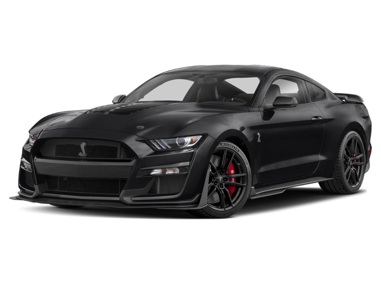 <p>Immerse yourself in the breathtaking power and style of the 2020 Ford Mustang Shelby GT500 Fastback. Draped in a sleek black exterior and possessing a formidable rear-wheel-drive, this coupe is engineered to thrill with its impressive handling capabilities.</p> <p>Step inside and experience the sophistication of a gray leather-trimmed interior, boasting heated and cooled front seats for optimal comfort, year-round. The leather steering wheel and door trim accentuate the Mustang's luxurious yet sporty feel, while alloy wheels and a bold design make a head-turning exterior statement.</p><p>At the heart of the Shelby GT500 lies a ferocious 5.2L Supercharged V8 engine paired with an automatic transmission, delivering an astounding 760 horsepower at 7300 RPM. This beast doesn't just offer raw power; its comprehensive tech package includes a navigation system, a Wi-Fi hotspot, and smart device integration. Safety and convenience are paramount with features such as a backup camera, lane assist, cruise control, and keyless entry, ensuring a secure yet exhilarating driving experience.</p><p>This vehicle will particularly resonate with driving enthusiasts and those who value performance and style in equal measure. Whether it's the weekend warrior or the everyday driving aficionado, the Mustang Shelby GT500 is poised to ignite your passion. Contact Summit Ford today to learn more about this extraordinary machine and discover how you can make it yours.</p>