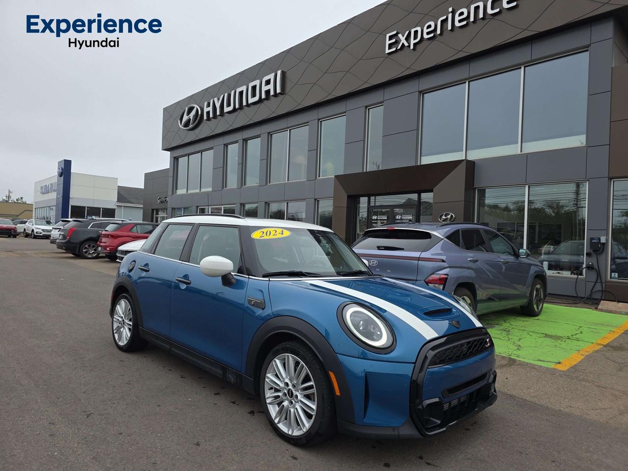 Recent Arrival! 
Island Blue Metallic 2024 MINI Cooper S FWD 7-Speed Automatic 2.0L 16V TwinPower Turbo

One Owner, Clean Carfax Report.
Apple CarPlay Preparation, Four wheel independent suspension, Heated Front Seats, Leatherette Upholstery, MINI Driving Modes, MINI Navigation System, Nappa Leather Steering Wheel, Panoramic Glass Sunroof, Wheels: 16" Revolite Spoke, White Roof & Mirror Caps.<b> Were PEIs Premier Credit Specialists! Good poor, bad, or new credit? Divorced? Self-Employed? We have you covered! Our Credit Specialists are on standby 24/7 to help get you behind the wheel today! APPLY FOR YOUR PRE-APPROVAL TODAY - https://www.steeleadvantagefinancing.com/7182
