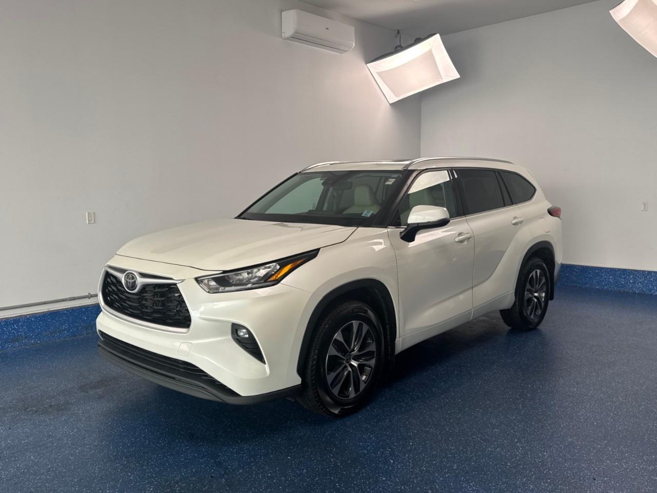 Recent Arrival! 2021 Toyota Highlander XLE AWD XLE | 8 passenger | Sunroof | Zacks Certified. 8-Speed Automatic AWD Blizzard Pearl 3.5L 6-Cylinder<br /><br /><br />AWD, 3rd row seats: split-bench, Air Conditioning, AM/FM radio: SiriusXM, Apple CarPlay/Android Auto, Automatic temperature control, Exterior Parking Camera Rear, Front Bucket Seats, Front fog lights, Heated door mirrors, Heated Front Seats, Power driver seat, Power Liftgate, Power moonroof, Power windows, Radio: Audio Plus w/Remote, Rear air conditioning, Remote keyless entry, Split folding rear seat, Telescoping steering wheel, Tilt steering wheel, Turn signal indicator mirrors, Wheels: Unique 18''' Alloy.<br /><br />Certification Program Details: Fresh 2 Yr MVI | 30 day warranty* | 110 point inspection | Full tank of fuel | Krown rustproofed | Flexible financing options | Professionally detailed<br /><br />This vehicle is Zacks Certified! You're approved! We work with you. Together we'll find a solution that makes sense for your individual situation. Please visit us or call 902 843-3900 to learn about our great selection.<br />Awards:<br /> * ALG Residual Value Awards, Residual Value Awards<br />With 22 lenders available Zack's Auto Sales can offer our customers with the lowest available interest rate. Thank you for taking the time to check out our selection!
