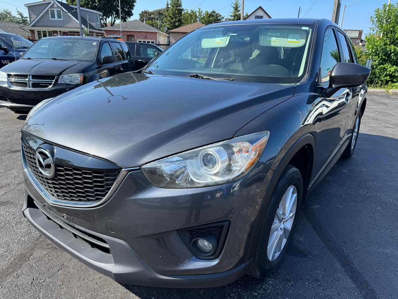 <div><div><div><div><div><div><div><div><div><div><div><div><div><div><div><p>✅ Certified | <strong>2014 Mazda CX-5 GS | 2.5L | FWD | No Accidents</strong></p><p>This Certified 2014 Mazda CX-5 GS is a stylish and fuel-efficient SUV powered by the <strong>2.5L SKYACTIV-G engine</strong>, offering sporty handling, everyday practicality, and a <strong>clean accident-free history</strong>. A great choice for commuters or small families.</p><p>🔹 <strong>2.5L SKYACTIV-G 4-Cylinder Engine</strong><br>🔹 Automatic Transmission<br>🔹 <strong>Front-Wheel Drive (FWD)</strong><br>🔹 <strong>No Accidents</strong><br>🔹 <strong>GS Trim &mdash; Well Equipped</strong><br>🔹 Backup Camera<br>🔹 Heated Front Seats<br>🔹 Bluetooth &ndash; Hands-Free Calling & Audio Streaming<br>🔹 Steering Wheel Audio & Cruise Controls<br>🔹 Cruise Control<br>🔹 Air Conditioning<br>🔹 Keyless Entry<br>🔹 Push-Button Start<br>🔹 Power Windows, Locks & Mirrors<br>🔹 Alloy Wheels<br>🔹 Split Folding Rear Seats<br>🔹 Traction Control & ABS<br>🔹 Excellent Fuel Economy<br>🔹 Runs and Drives Excellent</p><p>📍 Visit Us:<br>74 Parkdale Avenue North, Hamilton, Ontario</p><p>📞 Call or Text:<br>(905) 975-9705 / (905) 462-5542</p><p>📧 Email:<br><a href=mailto:gusmarkos@gmail.com>gusmarkos@gmail.com</a></p><p>🗓️ Test Drives by Appointment Only &mdash; Book Yours Today</p><p>🛡️ Buy With Confidence &mdash; OMVIC Licensed Dealership<br>✔️ CARFAX VERIFIED &mdash; Full History & Lien-Free<br>✔️ No Hidden Fees &mdash; Just Price + HST + Licensing<br>✔️ Trade-Ins Welcome &mdash; Top Dollar for Your Vehicle<br>✔️ Don&rsquo;t See What You Want? We&rsquo;ll Find It for You</p><p>💻 100% Online Purchase Available &mdash; Financing & Delivery Options<br>🚗 Ontario-Wide Delivery Available<br>✈️ Ask About Our Customer Travel Program</p></div></div></div></div><div>&nbsp;</div></div></div></div></div></div></div></div></div></div></div></div><div><div><div><div><div><div>&nbsp;</div></div></div></div></div></div>
