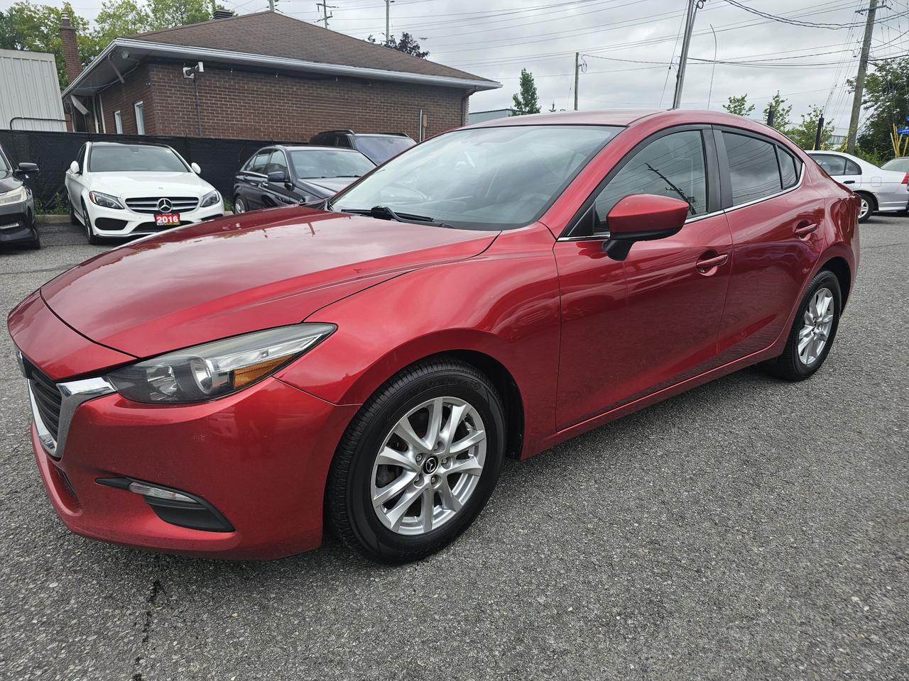 <p>2017 Mazda3 SE &ndash; Accident Free &ndash; Certified Ontario & Quebec<br>💲Priced 12900 + TAX + LICENSING.</p><p>Ronys Auto Sales is proud to offer this 2017 Mazda3 SE with 132608 km. This accident-free sedan is in excellent condition, comes certified in Ontario or Quebec, and is ready to drive home!<br>Features Include:<br>Accident Free<br>Heated leather seats<br>Power drivers seat<br>Reverse backup camera<br>Tinted windows<br>Keyless entry<br>Power windows<br>Power locks<br>Air conditioning<br>Bluetooth connectivity<br>Steering wheel audio & cruise controls<br>Alloy wheels<br>Excellent fuel economy<br>Clean inside and out<br>✅ Certified for Ontario or Quebec<br>📍 Ronys Auto Sales<br>1367 Labrie Avenue, Ottawa, Ontario<br>Financing options available. Trade-ins are welcome.<br>Call or message today to book your test drive before its gone!</p>