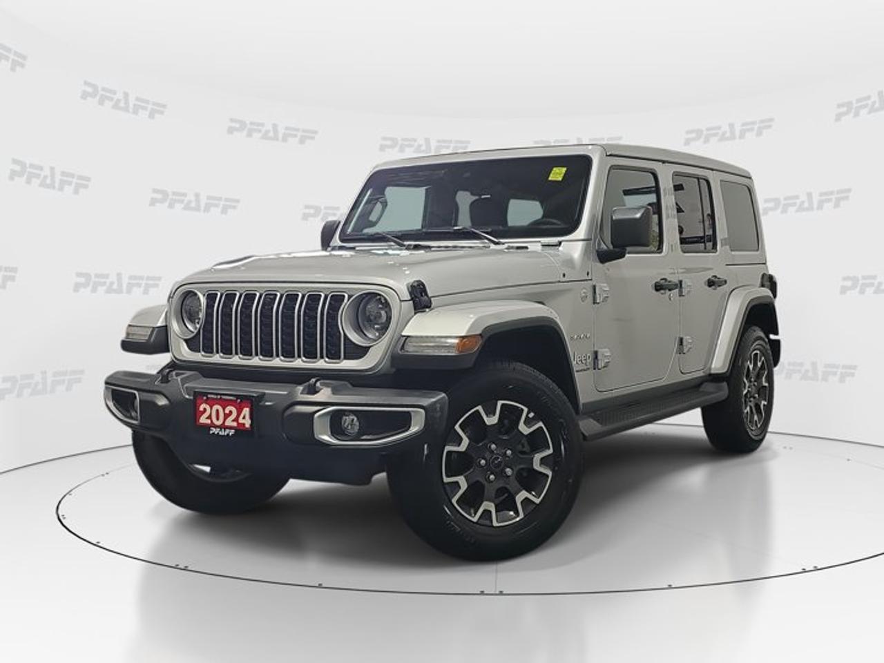 ** This disclosure applied to pre-owned inventory only: The online price includes a $1000 financing credit. For cash purchases, an additional $1000 dollars will be added to the price.*Meet the 2024 Jeep Wrangler Sahara, a used SUV that brings iconic open-air freedom, proven 4x4 confidence, and everyday comfort together in one well-equipped package. Finished in Silver with a Black interior, this four-door Wrangler Sahara at Honda of Thornhill has 17,858 km and an automatic transmission for easy driving.This 2024 Jeep Wrangler Sahara is built for drivers who want real utility with modern convenience. Its removable hardtop design, heated features, and smart connectivity make it a great fit for city streets in Thornhill and weekend escapes beyond town. It delivers the classic Jeep experience with practical features you will use often.FEATURES OF THE Wrangler SaharaFour-door body adds easy rear accessConvertible hardtop supports open-air drivingSilver exterior with bold Jeep characterAutomatic transmission for simple daily drivingADVANCED SAFETY FEATURESBackup camera helps with reversing confidenceAnti-lock braking system supports controlled stopsStability control helps maintain vehicle balanceChild safety locks add family peacePERFORMANCE AND EFFICIENCYDOHC engine design supports smooth powerAutomatic transmission delivers easy operationLimited slip differential aids traction performanceTraction control helps on changing surfacesCOMFORT AND CONVENIENCEHeated front seats add winter comfortHeated steering wheel feels great in coldRemote starter helps prepare cabin earlyCruise control supports relaxed highway travelTECHNOLOGY AND CONNECTIVITYBluetooth integration supports hands-free callingSmart device integration keeps apps accessibleWiFi hotspot adds connected travel convenienceSteering wheel audio controls ease useCARGO SPACEFour-door layout improves gear-loading accessRear cargo area handles daily essentialsSpare tire adds extra travel reassuranceFlexible space suits errands and tripsWHAT OTHER OWNERS LIKEOpen-air driving creates unique everyday funStrong traction inspires confidence year-roundHeated features improve cold-weather comfortEasy tech makes commuting more enjoyableThe 2024 Jeep Wrangler Sahara also includes power steering, power windows, keyless entry, heated mirrors, front air conditioning, an adjustable steering wheel, satellite radio, automatic headlights, rollover protection, fog lights, tire pressure monitoring, an auto-dimming rearview mirror, and aluminum wheels. These features help create a balanced SUV that feels ready for both routine drives and more adventurous plans.With its unmistakable design, removable hardtop, and useful comfort features, this 2024 Jeep Wrangler Sahara stands out as a smart choice for drivers who want capability without giving up convenience. It offers the rugged character Jeep is known for, paired with the everyday features many drivers value most.This 2024 Jeep Wrangler Saharas VIN is: 1C4PJXEN8RW101970.