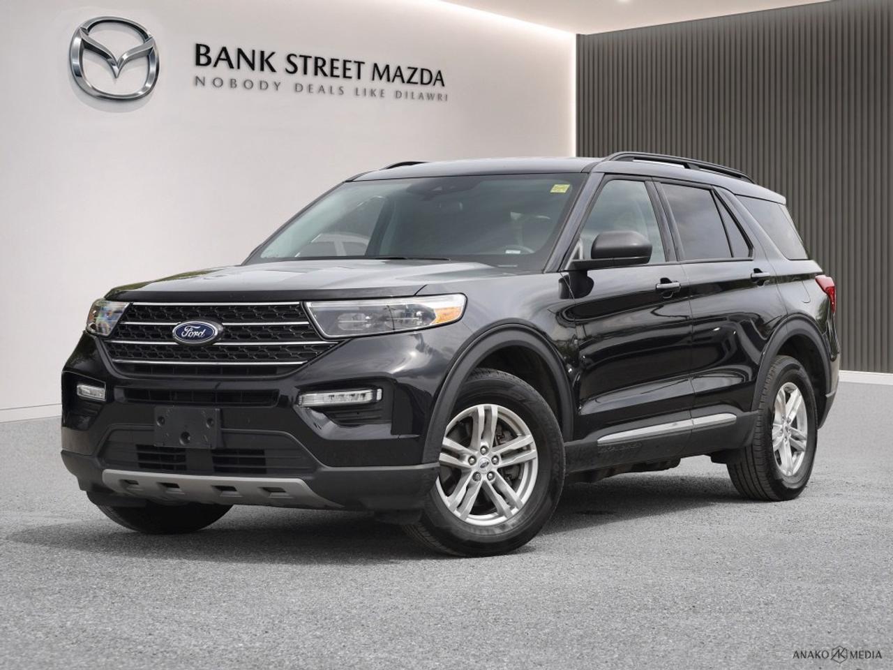 Experience the commanding presence of the 2023 Ford Explorer XLT, draped in a striking black finish and equipped with versatile 4×4 capabilities, perfect for handling diverse Canadian road conditions with confidence. Step inside this SUV and enjoy a spacious cabin that blends practicality and comfort. The Explorer stands out with its alloy wheels and power seats, and features like keyless entry add to its ease of use. With three rows of seating, its designed to accommodate your crew comfortably, making it an ideal family vehicle. Stay connected and entertained with smart device integration and a Bluetooth connection, while the backup camera and parking sensors enhance your driving experience with added safety and convenience. In addition, lane assist and brake assist offer peace of mind on the road, while the cruise control maintains a smooth ride. Drivers will also appreciate essentials like heated seats and mirrors for those chillier days. Under the hood, youll find reliable performance delivered by an efficient 2.3L I-4 EcoBoost engine. Whether youre a family looking for room to grow or an adventurer needing a capable ride, the 2023 Explorer XLT is ready to elevate your driving experience. Contact Bank Street Mazda for more information and let us help you make this exceptional vehicle yours.