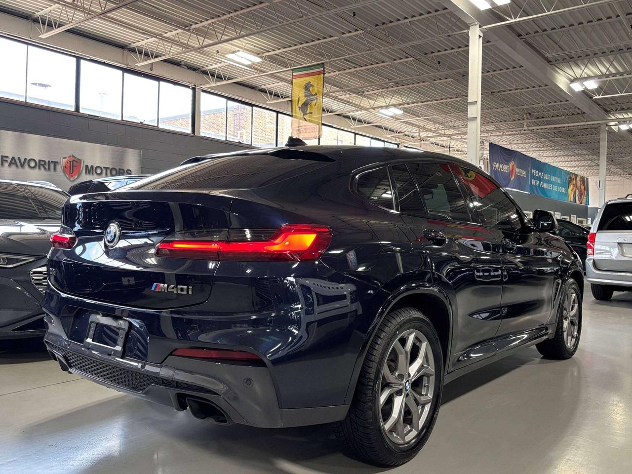 2019 BMW X4 M40i|MPERFORMANCE|AWD|NAV|REDLEATHER|HUD|HARMAN|+ Photo