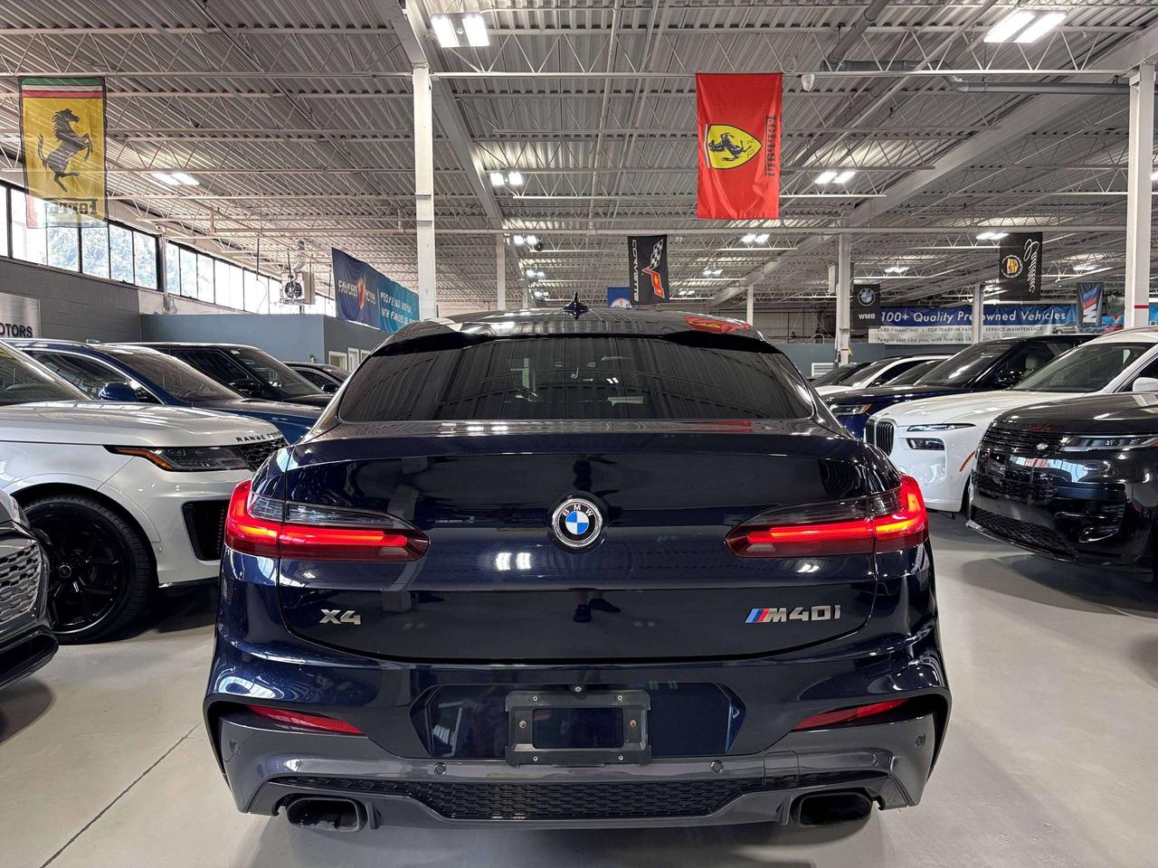 2019 BMW X4 M40i|MPERFORMANCE|AWD|NAV|REDLEATHER|HUD|HARMAN|+ Photo