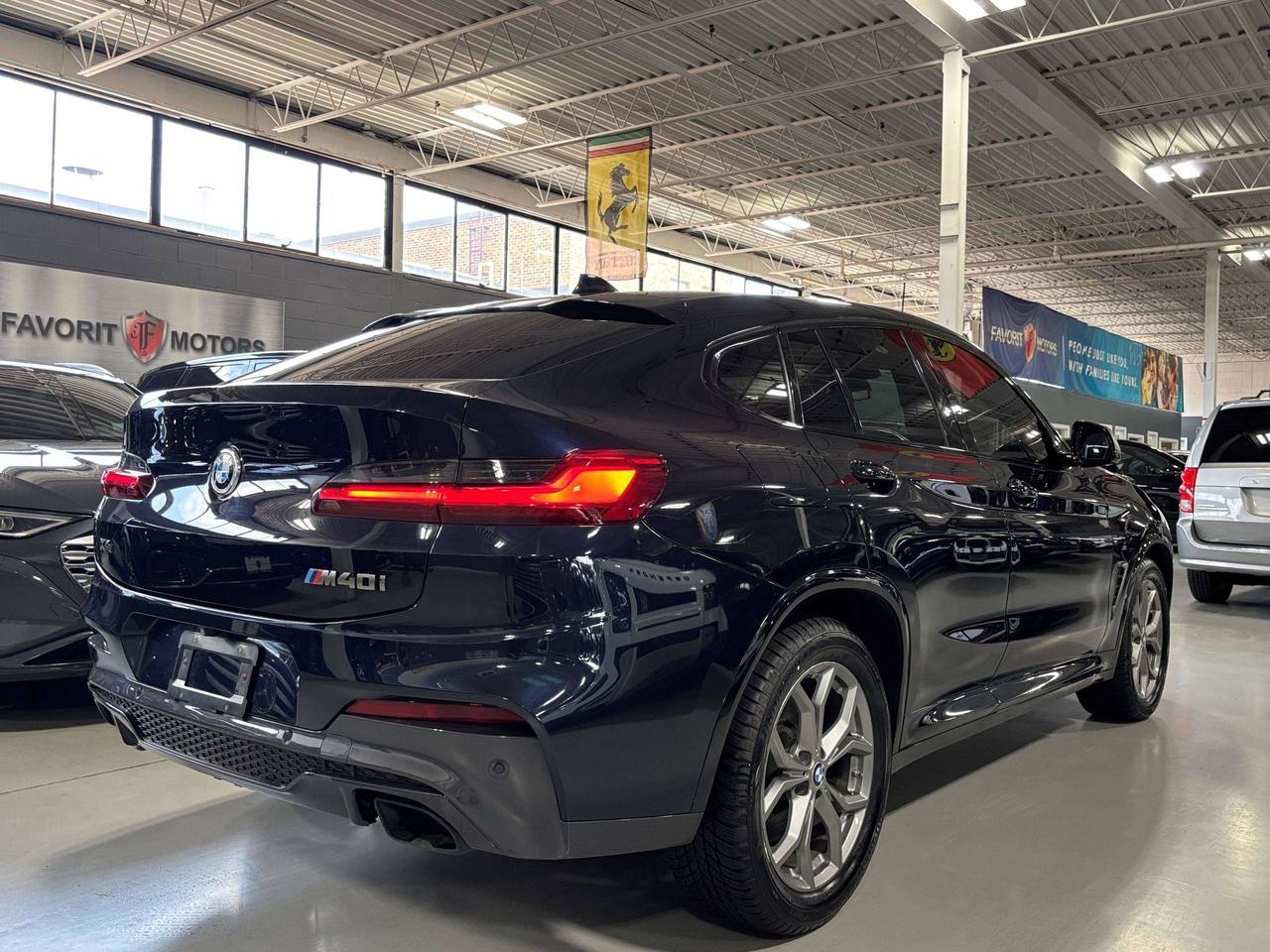 2019 BMW X4 M40i|MPERFORMANCE|AWD|NAV|REDLEATHER|HUD|HARMAN|+ Photo