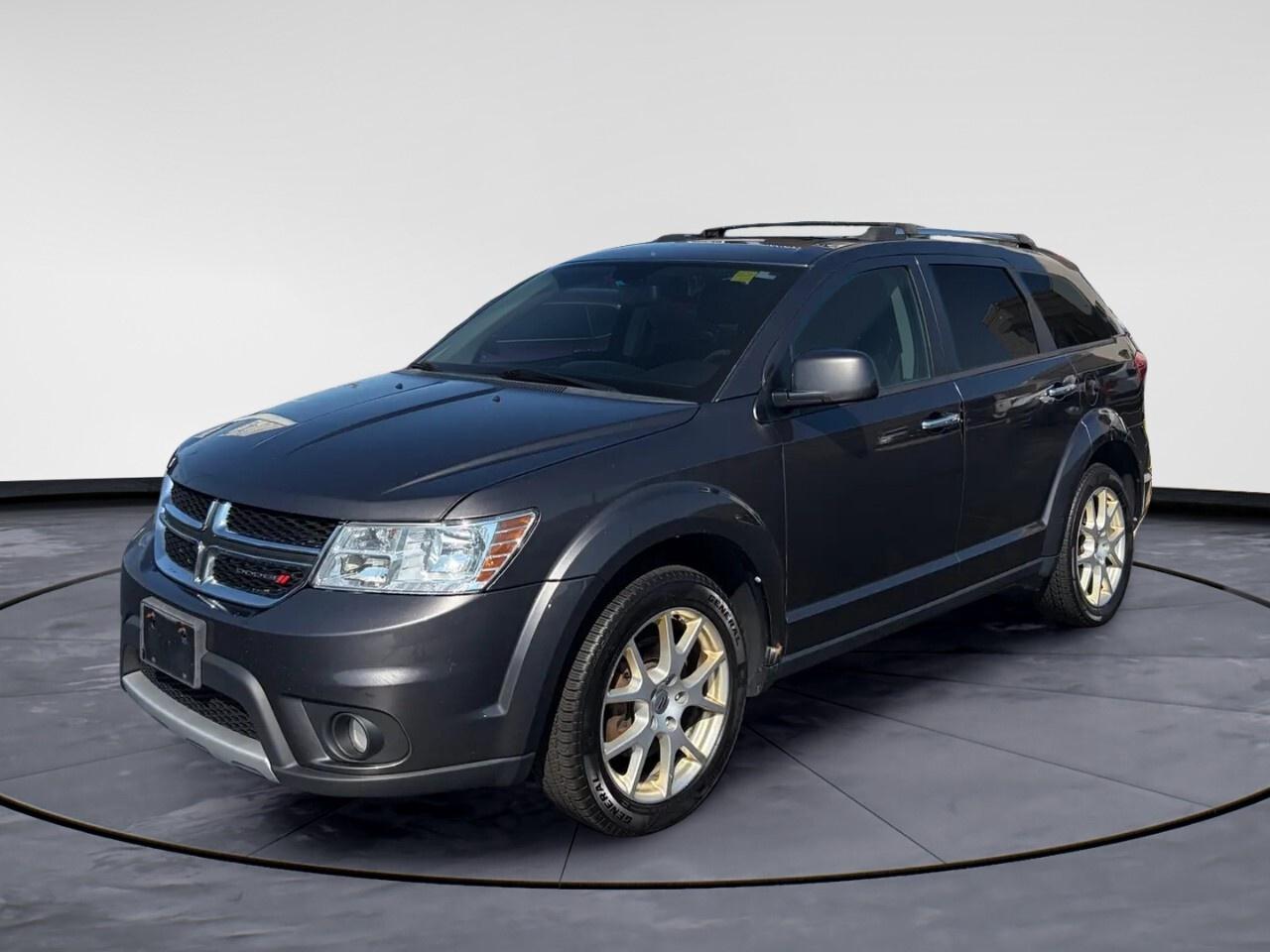 Introducing the sophisticated 2018 Dodge Journey GT AWD in a captivating finish. With all-wheel drive, it delivers exceptional handling on diverse Canadian roads, ensuring a smooth and stable ride through Windsors ever-changing weather conditions.
 
The exterior of this SUV exudes confidence, matched by a refined interior that features luxurious leather seats and a leather steering wheel, adding a touch of class to every journey. The heated seats and mirrors are perfect companions for those chilly winter mornings.
 
Benefit from advanced technology with a Bluetooth connection and a satellite radio system, ensuring entertainment options for every trip. Safety is a priority with brake assist and parking sensors, providing peace of mind on every drive. The convenience of keyless entry, power seats, and remote start make every day a breeze, while the sophisticated ENGINE: 3.6L PENTASTAR VVT V6 offers a performance as robust as your lifestyle demands.
 
This Dodge Journey GT AWD, with its blend of practicality and style, is an excellent choice for active families and professionals looking to navigate through Windsor with ease and elegance. Contact Windsor Chrysler today to discover more about this versatile SUV and take it for a test drive.