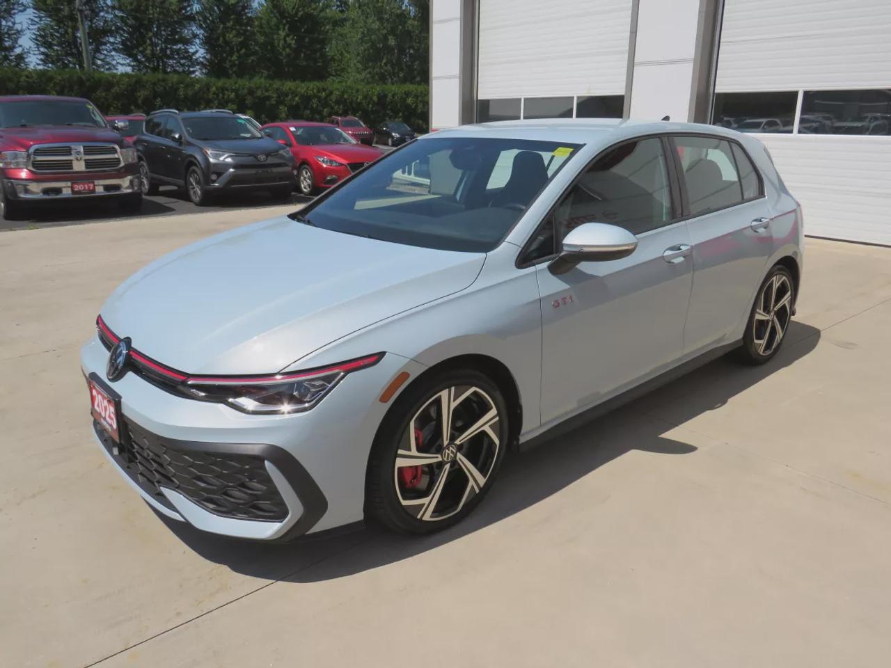 2025 Volkswagen Golf GTI Base | FWD | Automatic | Alloy Wheels | Heated Seats | Heated Steering Wheel | Climate Control | Touchscreen Display | Digital Driver Display | Navigation | Android Auto & Apple CarPlay | Bluetooth | USB-C Ports | Wireless Charging | Back-Up Camera |  Photo