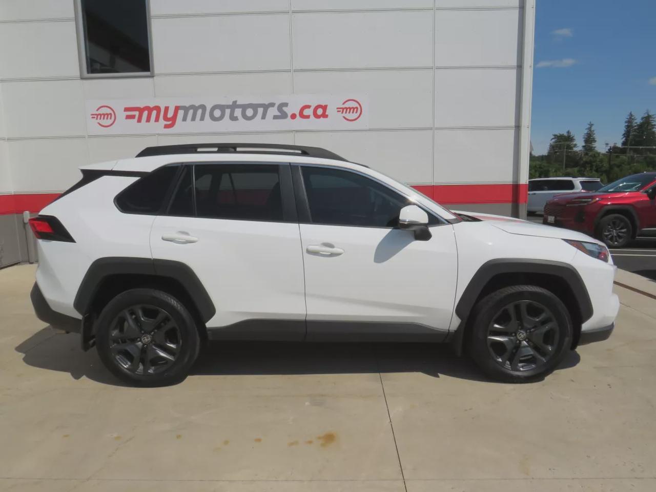 2023 Toyota RAV4 Trail | AWD | Automatic | Alloy Wheels | Heated Steering Wheel | Dual Climate Control | Heated Seats | Power Driver Seat | Sunroof | Touchscreen Display | Android Auto & Apple CarPlay | Bluetooth | USB Ports | Back-Up Camera | Adaptive Cruise Control | Bl Photo