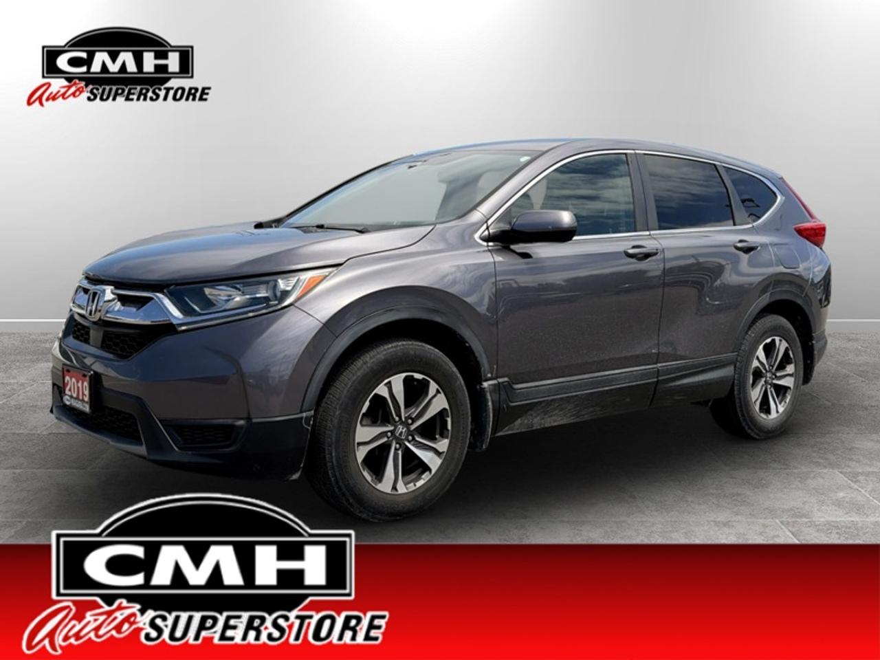 <b>Low Mileage!</b><br> <br> <br>CMH certifies that all vehicles meet DOUBLE the Ministry standards for Brakes and Tires. The advertised price is the promotional financing price. For all other methods of payment, the selling price is $500 higher.<br><br> <br>This 2019 Honda CR-V is for sale today.<br> <br>This stylish 2019 Honda CR-V has a spacious interior and car-like handling that captivates anyone who gets behind the wheel. With its smooth lines and sleek exterior, this gorgeous CR-V has no problem turning heads at every corner. Whether youre a thrift-store enthusiast, or a backcountry trail warrior with all of the camping gear, this practical Honda CR-V has got you covered!<br> <br>This low mileage SUV has just 78,443 km. Its Modern Steel Metallic in colour. It has an Automatic transmission and is powered by a 190HP 1.5L 4 Cylinder Engine. <br> <br> Our CR-Vs trim level is LX. This capable and comfy compact SUV offers a 7 inch touchscreen HondaLink infotainment system with HandsFreeLink bilingual Bluetooth, Apple CarPlay, Android Auto, rear view camera, and a 4 speaker sound system. Other luxury features include dual-zone automatic climate control, remote start, automatic headlamps, heated seats, LED daytime running lights, heated power mirrors, and aluminum wheels.<br> <br>To apply right now for financing use this link: <a href=https://www.cmhniagara.com/financing/ target=_blank>https://www.cmhniagara.com/financing/</a><br> <br/><br>**PLEASE NOTE:** The functionality and condition of any accessories and aftermarket parts are not guaranteed by CMH Auto Superstore. Examples of such items include, but are not limited to: tonneau covers, radios, cameras, remote starts, vent visors, roof racks, winches, light bars, headlights/tail lights, center caps, running boards, etc. If an aftermarket part is safety-related and found to be defective, it will be replaced by a factory option.<br><b>**CMH Auto Superstore reserves the right to choose to repair, modify, or replace all aftermarket parts (example  headlights) or accessories at its sole discretion.**</b><br><br>Trade-ins are welcome! Financing available OAC ! Price INCLUDES a valid safety certificate! Price INCLUDES a 60-day limited warranty on all vehicles except classic or vintage cars. CMH is a Full Disclosure dealer with no hidden fees. We are a family-owned and operated business for over 30 years! o~o