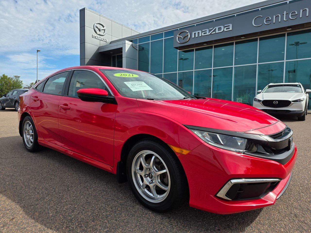 <span>The Honda Civic is Canadas go-to car. Its a Canadian-built Canadian favourite, and with good reason: Honda has spent decades building a peerless reputation for durability, performance, safety, efficiency, and value.&nbsp;</span>




<span>The 2021 Honda Civic LX is the 10th generation in a long line of excellent Civics. The Civic LX, rated at 6.1 L/100km in highway driving, is stuffed with great equipment, including Apple CarPlay/Android Auto compatibility. The Civic LX has 8-speaker audio, automatic climate control, a multi-angle rearview camera, Bluetooth, cruise control, keyless entry, and heated front seats, as well. And dont forget Honda Sensing, with features such as forward collision warning, adaptive cruise control, and lane keeping assist.</span>




Thank you for your interest in this vehicle. Its located at Centennial Mazda, 402 Mt. Edward Road, Charlottetown, PEI. We look forward to hearing from you &ndash; call us at 1-902-894-8593.