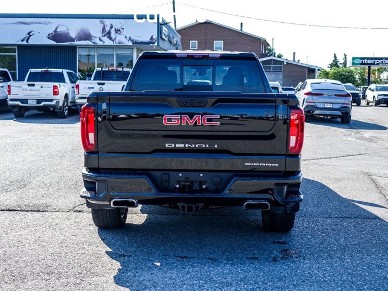 2025 GMC Sierra 1500 Denali 4WD Crew Cab 157"6.2L Leather 5 passengers with captain chair Multi Pro TailGate Photo