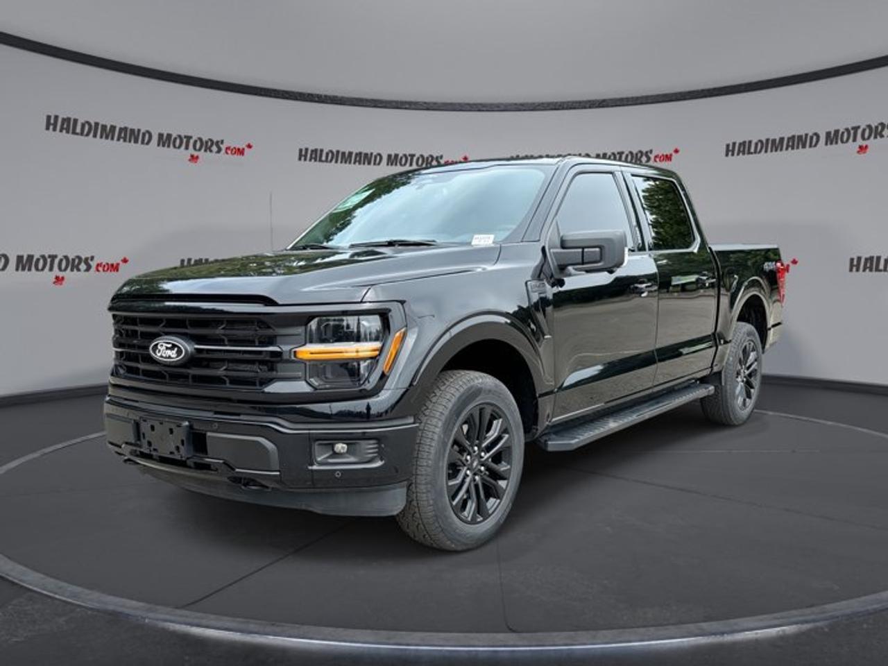 // ACCIDENT FREE!! //<br />// SINGLE OWNER! //<br /><br />This 2024 Ford F-150 XLT SuperCrew 5.5 Box 4WD is a smart full-size truck for work and daily life. It is finished in Black with a Black interior, has 43,028 km, and comes with one-owner history plus a clean accident-free report. At Haldimand Motors Ltd. in Cayuga, this F-150 offers strong capability, useful technology, and the comfort many drivers want in a modern pickup.<br /><br />Powered by a 2.7-litre engine and paired with an automatic transmission, this 2024 Ford F-150 XLT SuperCrew 5.5 Box 4WD delivers smooth power and easy control. Four-wheel drive adds confidence in changing Ontario weather, while the roomy four-door SuperCrew layout gives passengers generous space for commuting, family travel, or jobsite duty.<br /><br />FEATURES OF THE F-150 XLT SuperCrew 5.5 Box 4WD | One Owner | No Accidents<br /><br />   Black exterior with bold truck presence<br />   SuperCrew cab with four full doors<br />   Automatic transmission for smooth daily driving<br />   43,028 km showing light used wear<br /><br />TRUCK FEATURES<br /><br />   4,671 kg towing capacity for big jobs<br />   Trailer hitch ready for hauling needs<br />   Rear tow hook adds useful recovery help<br />   5.5-foot box suits daily cargo tasks<br /><br />ADVANCED SAFETY FEATURES<br /><br />   Backup camera helps with tight parking<br />   Blind spot monitor adds lane awareness<br />   Lane departure warning supports safer travel<br />   Anti-lock braking system aids control<br /><br />This truck is well equipped with safety items that matter every day. Stability control, tire pressure monitoring, child safety locks, head side airbags, side impact airbags, and a passenger airbag sensor all help support peace of mind. The 360-degree camera adds welcome visibility when parking, hitching up, or moving through crowded spaces.<br /><br />PERFORMANCE AND EFFICIENCY<br /><br />   2.7-litre engine balances power and efficiency<br />   Four-wheel drive boosts all-season traction<br />   Adaptive cruise control eases highway travel<br />   Dual shift mode supports smooth response<br /><br />The power steering and automatic transmission make this truck easy to handle in town and on the highway. Off-road tires add extra grip on rougher surfaces, while cruise control and adaptive cruise control help reduce fatigue on longer drives. This setup gives the F-150 a capable, confident feel without making daily use harder.<br /><br />COMFORT AND CONVENIENCE<br /><br />   Dual-zone climate control keeps comfort balanced<br />   Driver power seat adds easy adjustment<br />   Passenger lumbar support improves longer trips<br />   Panoramic sunroof brightens the cabin<br /><br />Inside, this truck is built for comfort and convenience. Front air conditioning, automatic climate control, power windows, automatic door locks, heated mirrors, electric mirrors, tinted windows, and an auto-dimming rearview mirror all add ease to your routine. The adjustable steering wheel and steering wheel audio controls keep key functions close at hand.<br /><br />TECHNONOLGY AND CONNECTIVITY<br /><br />   Apple CarPlay connects favourite phone apps<br />   Android Auto adds simple smartphone access<br />   Bluetooth integration supports hands-free calling<br />   Navigation system helps guide every trip<br /><br />This F-150 also includes a WiFi hotspot, satellite radio, and LED headlamps for a more modern driving experience. Automatic headlights and fog lights help with visibility in poor weather or low light. The cabin layout is practical and easy to use, making this truck a strong fit for busy drivers.<br /><br />CARGO SPACE<br /><br />   SuperCrew cabin adds flexible interior storage<br />   Rear access helps load larger items<br />   Pickup box handles tools and gear<br />   Steps help cabin entry and exit<br /><br />The 5.5-foot box gives you useful space for equipment, weekend supplies, and everyday cargo. The rear access area and spacious cabin make it easier to carry both passengers and gear. Whether you are loading work materials or travel bags, this F-150 is designed to stay practical.<br /><br />WHAT OTHER OWNERS LIKE<br /><br />   Smooth ride for a full-size truck<br />   Strong towing ability for everyday needs<br />   Spacious crew cab for family use<br />   Easy tech features drivers quickly learn<br /><br />This 2024 Ford F-150 XLT SuperCrew 5.5 Box 4WD | One Owner | No Accidentss VIN is: 1FTEW3LP3RFA14015 .<br /><br />WHY CHOOSE US? <br /><br />Honest & Transparent Buying Experience: Weve been a trusted name in business since 1984.<br /><br />STRAIGHTFORWARD PRICING:<br />Our Advertised Price Includes:<br />>>Safety Certification (No separate fee!)<br />>>30-Day 100% Mechanical Warranty<br />>>FREE Carfax History Report.<br />>>No upcharge for paying cash.<br />(Prices Exclude HST and Licensing Fees only.)<br /><br />>>Browse 300+ vehicles all in ONE LOCATION<br /><br />EASY FINANCING: Great rates & open loans<br /><br />WE BUY CARS: Get Top Dollar for your trade-in, or sell us your vehicle for CASH! Even if you dont buy from us!<br /><br />STOP BY TODAY<br />Treat yourself - stop by Haldimand Motors Ltd. located at 42 Talbot St E, Cayuga, ON N0A 1E0 to make this car yours today!<br /><br />https://www.haldimandmotors.com/used/stock-461078.html