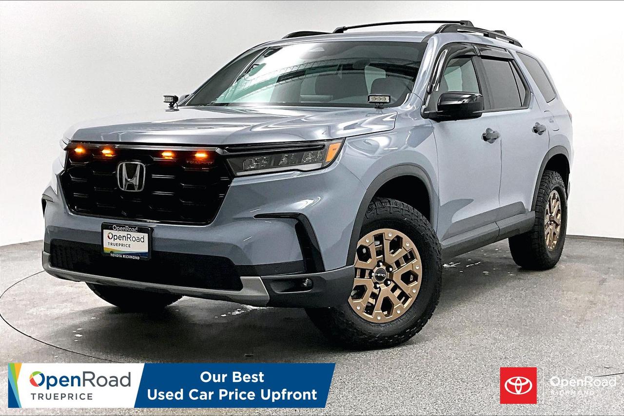 Clean title, One Owner! Buying a used car should be simple and stressfree  no guesswork, no negotiations  just the vehicles true price. Thats why were introducing OpenRoad TruePrice, a new way to buy used vehicles. One Price. TruePrice. Our best price upfront.  This 2023 Honda Pilot TrailSport AWD combines rugged off-road capability with spacious, family-friendly versatility in a rugged midsize SUV package. It comes equipped with rugged all-terrain tires, a tuned off-road suspension, skid plates, all-wheel drive, and a panoramic sunroof along with premium synthetic leather seating and a large touchscreen infotainment system. Fully inspected, clean-title, and turn-key, this adventure-ready SUV is prepared for any journey&mdash;message today to schedule your private viewing! ______________________________________________________________________________________________________________________________________  At Openroad Toyota Richmond, we offer the best used car warranty in Metro Vancouver. Our used car warranty program includes 30 days or 2,000 kilometres Exchange Privilege, 90 Day Powertrain Coverage*, Mechanical & Safety Check of up to 210 Points and a clean title. *90 Powertrain coverage will be offered at the discretion of management based on a case by case scenario.