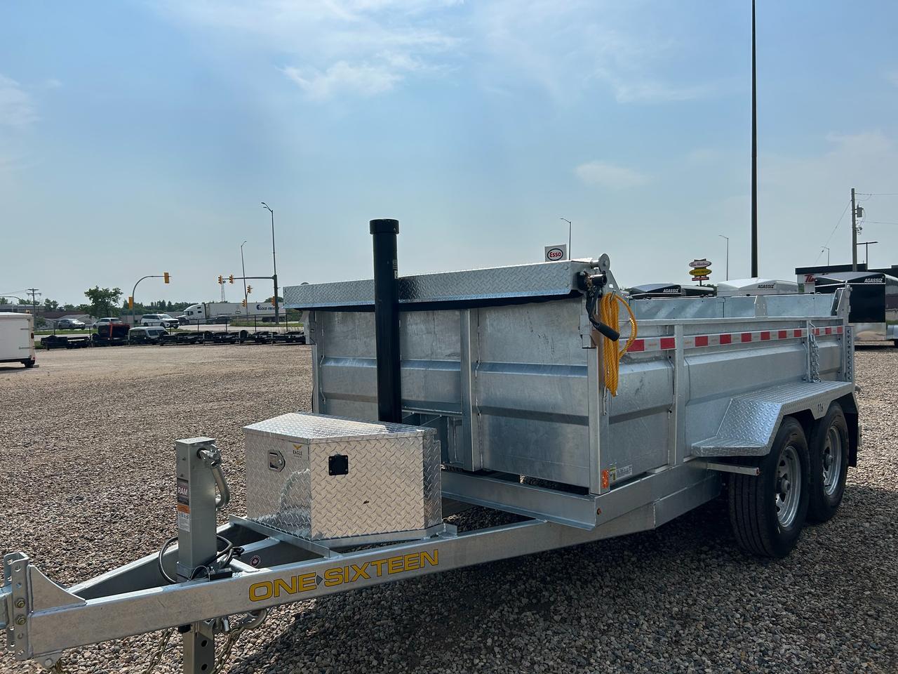 <p><strong>6 X 12 One Sixteen Galvanized Dump Trailer<br>GVWR: 14000# derated to 9900 lbs<br>Dry Weight: 3750<br></strong><strong>Standard Features:</strong></p><p style=margin-left: .5in; text-indent: -.25in; mso-list: l0 level1 lfo1; tab-stops: list .5in;><span style=font-size: 10.0pt; mso-bidi-font-size: 12.0pt; font-family: Symbol; mso-fareast-font-family: Symbol; mso-bidi-font-family: Symbol;>&middot;<span style=font: 7.0pt Times New Roman;>&nbsp;&nbsp;&nbsp;&nbsp;&nbsp;&nbsp;&nbsp;&nbsp;&nbsp;</span></span>Crossmembers Every 16</p><p style=margin-left: .5in; text-indent: -.25in; mso-list: l0 level1 lfo1; tab-stops: list .5in;><span style=font-size: 10.0pt; mso-bidi-font-size: 12.0pt; font-family: Symbol; mso-fareast-font-family: Symbol; mso-bidi-font-family: Symbol;>&middot;<span style=font: 7.0pt Times New Roman;>&nbsp;&nbsp;&nbsp;&nbsp;&nbsp;&nbsp;&nbsp;&nbsp;&nbsp;</span></span>Slipper Suspension</p><p style=margin-left: .5in; text-indent: -.25in; mso-list: l0 level1 lfo1; tab-stops: list .5in;><span style=font-size: 10.0pt; mso-bidi-font-size: 12.0pt; font-family: Symbol; mso-fareast-font-family: Symbol; mso-bidi-font-family: Symbol;>&middot;<span style=font: 7.0pt Times New Roman;>&nbsp;&nbsp;&nbsp;&nbsp;&nbsp;&nbsp;&nbsp;&nbsp;&nbsp;</span></span>16 Radial Tires</p><p style=margin-left: .5in; text-indent: -.25in; mso-list: l0 level1 lfo1; tab-stops: list .5in;><span style=font-size: 10.0pt; mso-bidi-font-size: 12.0pt; font-family: Symbol; mso-fareast-font-family: Symbol; mso-bidi-font-family: Symbol;>&middot;<span style=font: 7.0pt Times New Roman;>&nbsp;&nbsp;&nbsp;&nbsp;&nbsp;&nbsp;&nbsp;&nbsp;&nbsp;</span></span>Adjustable 2 5/16 Coupler</p><p style=margin-left: .5in; text-indent: -.25in; mso-list: l0 level1 lfo1; tab-stops: list .5in;><span style=font-size: 10.0pt; mso-bidi-font-size: 12.0pt; font-family: Symbol; mso-fareast-font-family: Symbol; mso-bidi-font-family: Symbol;>&middot;<span style=font: 7.0pt Times New Roman;>&nbsp;&nbsp;&nbsp;&nbsp;&nbsp;&nbsp;&nbsp;&nbsp;&nbsp;</span></span>12000 lb Jack</p><p style=margin-left: .5in; text-indent: -.25in; mso-list: l0 level1 lfo1; tab-stops: list .5in;><span style=font-size: 10.0pt; mso-bidi-font-size: 12.0pt; font-family: Symbol; mso-fareast-font-family: Symbol; mso-bidi-font-family: Symbol;>&middot;<span style=font: 7.0pt Times New Roman;>&nbsp;&nbsp;&nbsp;&nbsp;&nbsp;&nbsp;&nbsp;&nbsp;&nbsp;</span></span>4 Heavy duty D rings</p><p style=margin-left: .5in; text-indent: -.25in; mso-list: l0 level1 lfo1; tab-stops: list .5in;><span style=font-size: 10.0pt; mso-bidi-font-size: 12.0pt; font-family: Symbol; mso-fareast-font-family: Symbol; mso-bidi-font-family: Symbol;>&middot;<span style=font: 7.0pt Times New Roman;>&nbsp;&nbsp;&nbsp;&nbsp;&nbsp;&nbsp;&nbsp;&nbsp;&nbsp;</span></span>Sealed Harness & LED Lights</p><p style=margin-left: .5in; text-indent: -.25in; mso-list: l0 level1 lfo1; tab-stops: list .5in;><span style=font-size: 10.0pt; mso-bidi-font-size: 12.0pt; font-family: Symbol; mso-fareast-font-family: Symbol; mso-bidi-font-family: Symbol;>&middot;<span style=font: 7.0pt Times New Roman;>&nbsp;&nbsp;&nbsp;&nbsp;&nbsp;&nbsp;&nbsp;&nbsp;&nbsp;</span></span>24 High Side Panel</p><p style=margin-left: .5in; text-indent: -.25in; mso-list: l0 level1 lfo1; tab-stops: list .5in;><span style=font-size: 10.0pt; mso-bidi-font-size: 12.0pt; font-family: Symbol; mso-fareast-font-family: Symbol; mso-bidi-font-family: Symbol;>&middot;<span style=font: 7.0pt Times New Roman;>&nbsp;&nbsp;&nbsp;&nbsp;&nbsp;&nbsp;&nbsp;&nbsp;&nbsp;</span></span>Shielded Tarp</p><p style=margin-left: .5in; text-indent: -.25in; mso-list: l0 level1 lfo1; tab-stops: list .5in;><span style=font-size: 10.0pt; mso-bidi-font-size: 12.0pt; font-family: Symbol; mso-fareast-font-family: Symbol; mso-bidi-font-family: Symbol;>&middot;<span style=font: 7.0pt Times New Roman;>&nbsp;&nbsp;&nbsp;&nbsp;&nbsp;&nbsp;&nbsp;&nbsp;&nbsp;</span></span>Combo Gate</p><p style=margin-left: .5in; text-indent: -.25in; mso-list: l0 level1 lfo1; tab-stops: list .5in;><span style=font-size: 10.0pt; mso-bidi-font-size: 12.0pt; font-family: Symbol; mso-fareast-font-family: Symbol; mso-bidi-font-family: Symbol;>&middot;<span style=font: 7.0pt Times New Roman;>&nbsp;&nbsp;&nbsp;&nbsp;&nbsp;&nbsp;&nbsp;&nbsp;&nbsp;</span></span>Telescopic 3 Section Cylinder</p><p style=margin-left: .5in; text-indent: -.25in; mso-list: l0 level1 lfo1; tab-stops: list .5in;>** equipped with 14k suspension de-rated to 9900#**</p>