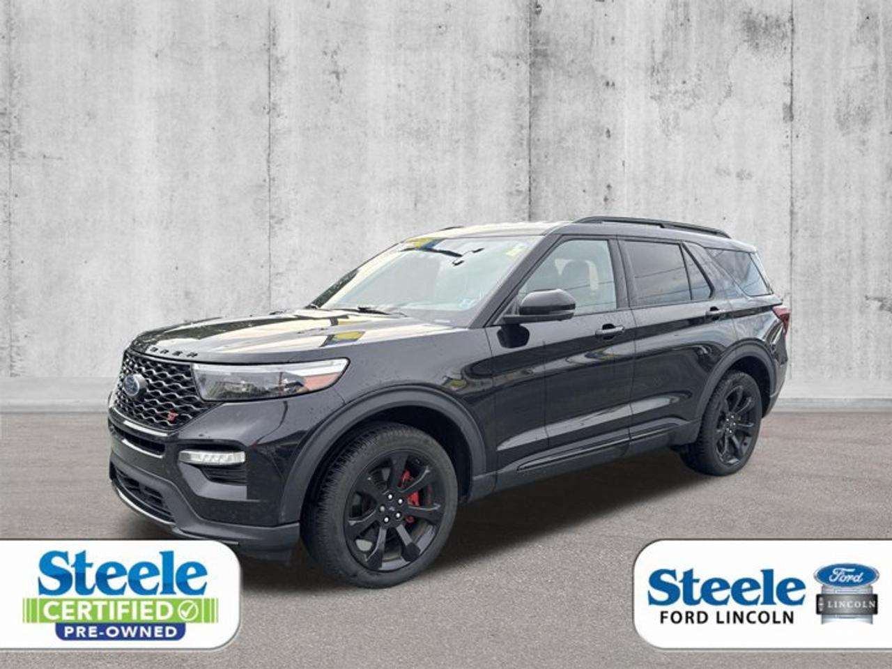 Top of the line - Clearance Unit - Priced to sell - Certified vehicle - Low rates available.Meet the 2022 Ford Explorer ST, a used SUV built to deliver strong performance, everyday utility, and confident four-wheel-drive capability in Halifax. Finished in Black with a Black interior, this four-door model pairs bold presence with a powerful 3.0 L twin-turbo premium gasoline V6 and smooth automatic transmission.With 70,647 km on the odometer, this 2022 Ford Explorer ST offers the kind of athletic character drivers want from a performance-focused SUV. Paddle shifters add a more engaging feel behind the wheel, while the power liftgate helps make loading cargo easier during busy days, family outings, or weekend travel.FEATURES OF THE Explorer ST»» Twin-turbo 3.0 L V6 performance»» Sport-focused ST driving character»» Paddle shifters for manual control»» Four-wheel drive for added tractionADVANCED SAFETY FEATURES»» Four-wheel drive aids slippery-road confidence»» Four-door design supports family accessibility»» Strong SUV structure for daily travel»» Automatic transmission allows smoother controlPERFORMANCE AND EFFICIENCY»» Twin-turbo premium gasoline V6 power»» 3.0 L engine delivers strong response»» Automatic transmission shifts smoothly and quickly»» Paddle shifters add sporty driver engagementCOMFORT AND CONVENIENCE»» Power liftgate helps with cargo access»» Four doors make entry more convenient»» Spacious SUV design suits daily use»» Black interior offers a clean lookTECHNOLOGY AND CONNECTIVITY»» Paddle shifters enhance driver interaction»» Automatic controls support easy operation»» Clear instrument access aids daily driving»» Practical layout keeps essentials nearbyCARGO SPACE»» Power liftgate simplifies loading and unloading»» SUV body style supports versatile hauling»» Rear cargo area suits everyday gear»» Useful space for errands or tripsAWARDS & RECOGNITIONS»» Top Safety Pick, Insurance Institute for Highway Safety, 2022WHAT OTHER OWNERS LIKE»» Strong acceleration from twin-turbo V6»» Confident all-weather four-wheel-drive capability»» Practical cargo room for family use»» Sportier feel with paddle shiftersThis 2022 Ford Explorer ST stands out for drivers who want more than basic transportation. It blends utility and performance in a well-rounded package that feels ready for commuting, road trips, and changing Maritime weather. The four-wheel-drive system adds confidence when roads are wet, snowy, or uneven.The Black exterior gives this 2022 Ford Explorer ST a sleek and assertive look that suits its performance identity. Inside, the Black cabin keeps the atmosphere refined and easy to maintain. Its practical four-door layout also makes it simple for passengers to get in and out.Sold by Steele Ford Lincoln in Halifax, this 2022 Ford Explorer ST is a smart choice for shoppers seeking a capable used SUV with real power and useful features. If you want strong V6 performance, everyday versatility, and the convenience of a power liftgate, this Explorer ST deserves a closer look.This 2022 Ford Explorer STs VIN is: 1FM5K8GC1NGB91503 .