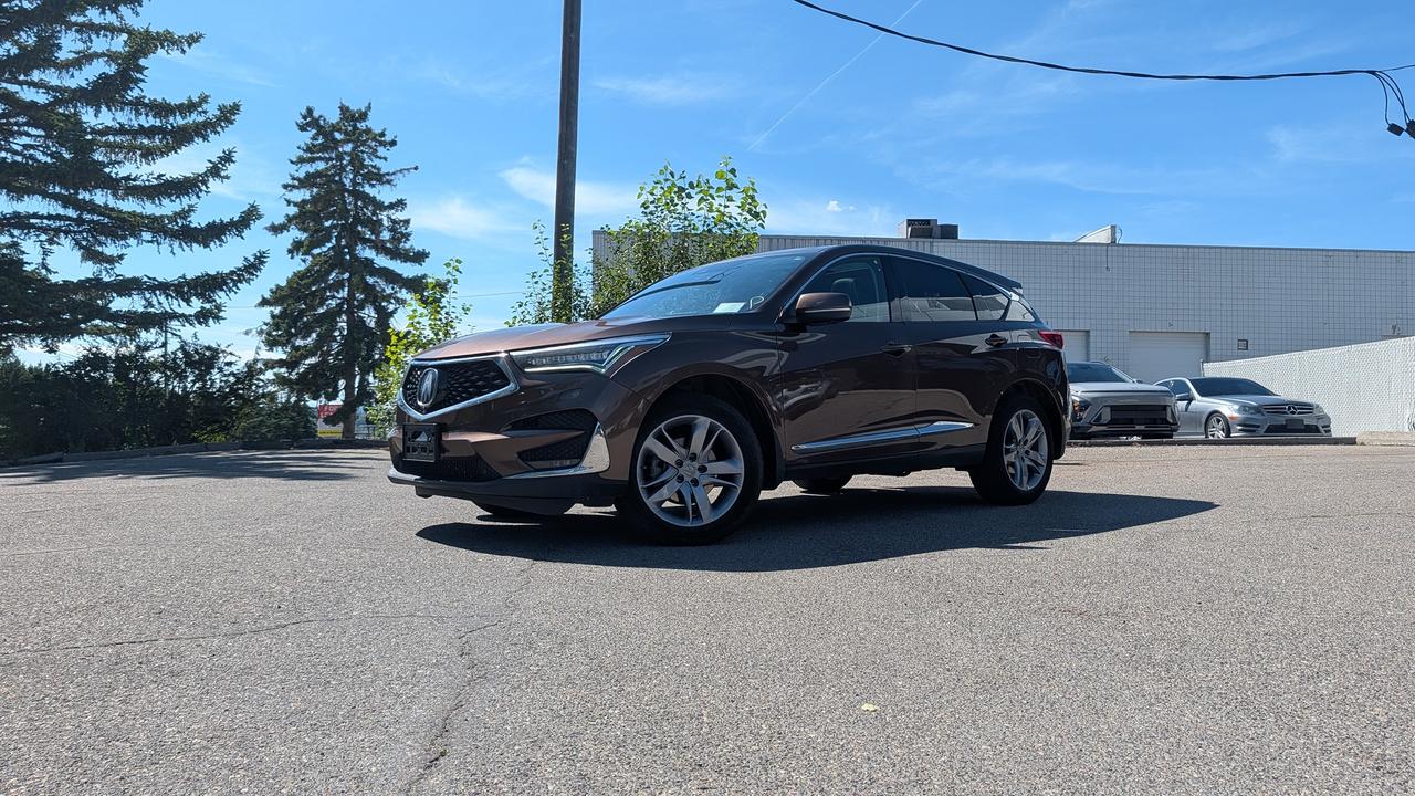 <p>Luxury Meets Performance: 2019 Acura RDX Platinum Elite! ✨</p><p>Elevate your daily drive with this stunning 2019 Acura RDX. Fully loaded with the top-tier Platinum Elite package, this SUV delivers an incredible blend of comfort, style, and technology.</p><p>Clean Carfax / Active Status / No Hail damage</p><p>Up to $1000 off any extended warranty package available</p><p>Vehicle Highlights: ✅ Pricing: $32,500 ✅ Striking Design: Gorgeous Canyon Bronze Metallic exterior over a luxurious Black leather cabin with genuine wood trim. ✅ Platinum Elite Exclusives:</p><p>Head-Up Display (HUD): Keep your eyes on the road with vital info projected right onto the windshield.</p><p>ELS Studio&reg; 3D Premium Audio: An immersive 16-speaker sound system.</p><p>Surround-View Camera System: Makes tight parking spots a breeze.</p><p>16-Way Power Front Seats: Dial in your exact driving position.</p><p>Adaptive Damper System: Delivers a perfectly balanced, smooth ride.</p><p>✅ Year-Round Comfort: Equipped with heated and cooled front seats, plus heated rear seats to keep everyone comfortable in any Alberta weather.</p><p>Stock #: 5J804456</p><p>View full details and photos here: https://faganauto.ca/inventory/2019-acura-rdx/14523895</p><p>📍Fagan Family Automotive &ndash; By Appointment Only, AMVIC Licensed Dealer &ndash; All prices plus GST and costs & charges associated with financing (No additional fees or charges for cash purchases)</p>