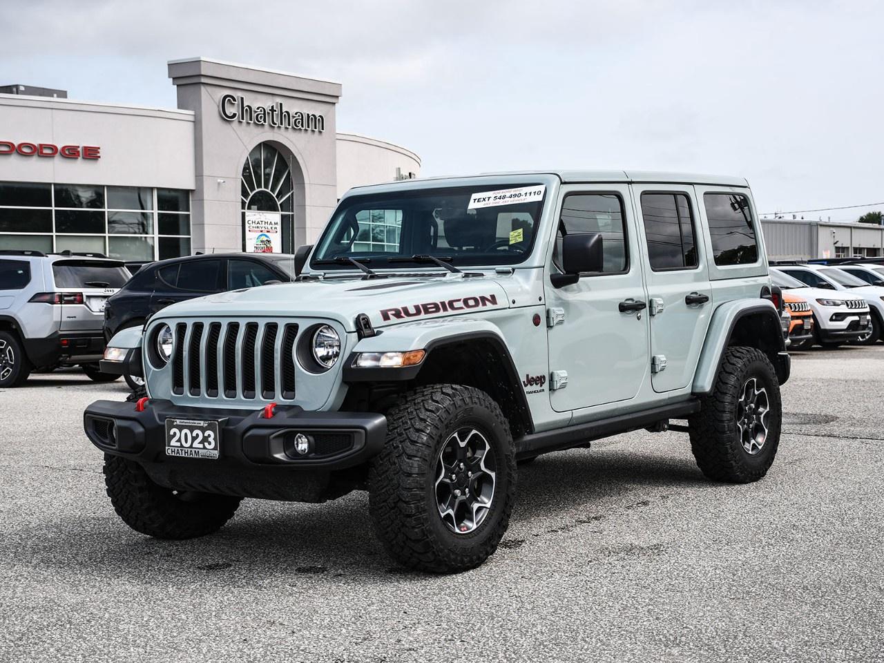 One owner. Trail-rated capability. One seriously cool colour.<br /><br />The 2023 Jeep Wrangler Rubicon isn't simply a Wrangler with a few extra badges. It's the model built for buyers who want genuine off-road hardware straight from the factory, while still offering the comfort and technology to make it enjoyable every day.<br /><br />This one-owner Wrangler Rubicon is finished in distinctive Earl Clearcoat, a unique grey-green colour that looks right at home on a Jeep and helps this Wrangler stand out from the usual sea of black, white, and grey SUVs.<br /><br />Under the hood is Jeeps proven 3.6L Pentastar V6, paired with an 8-speed automatic transmission and four-wheel drive. The Rubicon adds serious off-road credentials, including a 4.10 rear axle ratio, heavy-duty capability, and the hardware that has made the Rubicon the benchmark for factory-built off-road Wranglers.<br /><br />This one is also equipped with the Trailer Tow & HD Electrical Group, adding a Class II hitch receiver, 4- and 7-pin wiring harness, four auxiliary switches, and an upgraded 240-amp alternator, excellent equipment for anyone planning to add accessories, lighting, or towing capability.<br /><br />Up top is a body-colour 3-piece Freedom Hardtop, giving you the security and refinement of a hardtop with removable Freedom Panels when the weather calls for some open-air Jeep driving.<br /><br />Inside, Rubicon-branded seating and a rugged, functional cabin are complemented by plenty of modern comfort. The Cold Weather Group adds heated front seats and a heated steering wheel, while automatic climate control, power windows, keyless entry, and an auto-dimming rearview mirror make everyday driving easy.<br /><br />Technology includes the 8.4-inch Uconnect touchscreen with navigation, Apple CarPlay and Android Auto, SiriusXM, a nine-speaker audio system, steering-wheel-mounted controls, and a ParkView rear backup camera.<br /><br />But the real reason to own a Rubicon is simple: you can take the roof panels off for a summer drive, confidently tackle Canadian winters, head off the pavement when the opportunity presents itself, and still have a comfortable four-door SUV for Monday morning.<br /><br />Built for adventure. Comfortable enough for every day.<br /><br />Here at Chatham Chrysler, our Financial Services Department is dedicated to offering the service that you deserve. We are experienced with all levels of credit and are looking forward to sitting down with you. Chatham Chrysler Proudly serves customers from London, Ridgetown, Thamesville, Wallaceburg, Chatham, Tilbury, Essex, LaSalle, Amherstburg and Windsor with no distance being ever too far! At Chatham Chrysler, WE CAN DO IT!