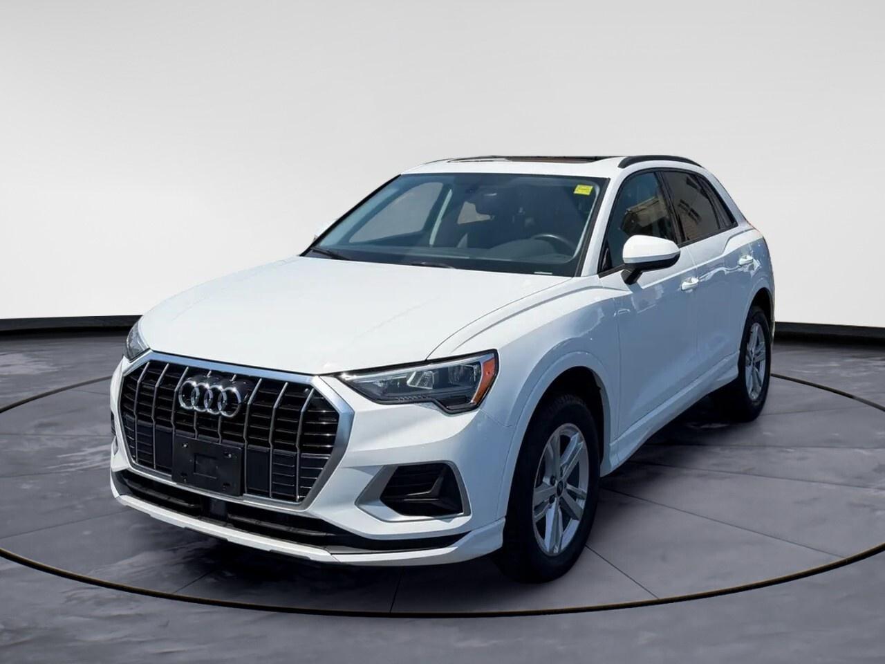 Introducing the 2022 Audi Q3 Komfort 40 TFSI quattro, a stunning white AWD SUV that combines performance with elegance. With its automatic transmission, this Audi delivers a smooth and confident drive, perfect for maneuvering through city streets or venturing on long drives.

Step into the refined interior with a sophisticated black color scheme, featuring premium leather seats that ensure comfort and style. The Q3s design is complemented by modern alloy wheels and the convenience of keyless entry. Enjoy the panoramic views through the sunroof/moonroof, enhancing every drive with natural light and air.

Technologically advanced, the Audi Q3 is equipped with a user-friendly infotainment system featuring smart device integration, satellite radio, and Bluetooth connection, keeping you connected wherever you go. Safety is a priority with features like a backup camera for easy parking, brake assist for added confidence, and heated mirrors to clear away the frost on chilly Canadian mornings.

If youre seeking a blend of luxury, comfort, and advanced features, the 2022 Audi Q3 Komfort is the perfect choice. Its designed for the discerning driver who values sophistication and high performance. Contact Windsor Chrysler today to learn more and arrange a personalized viewing or test drive of this impressive SUV.
 

PLEASE SEE OUR MAIN WEBSITE FOR MORE PICTURES AND CARFAX REPORTS * Buy in confidence at WINDSOR CHRYSLER with our 95-point safety inspection by our certified technicians. Searching for your upgrade has never been easier. You will immediately get the low market price based on our market research, which means no more wasted time shopping around for the best price, Its time to drive home the most car for your money today. OVER 100 Pre-Owned Vehicles in Stock! Our Finance Team will secure the Best Interest Rate from one of out 20 Auto Financing Lenders that can get you APPROVED! Financing Available For All Credit Types! Whether you have Great Credit, No Credit, Slow Credit, Bad Credit, Been Bankrupt, On Disability, Or on a Pension, we have options. Looking to just sell your vehicle? We buy all makes and models let us buy your vehicle. Proudly Serving Windsor, Essex, Leamington, Kingsville, Belle River, LaSalle, Amherstburg, Tecumseh, Lakeshore, Strathroy, Stratford, Leamington, Tilbury, Essex, St. Thomas, Waterloo, Wallaceburg, St. Clair Beach, Puce, Riverside, London, Chatham, Kitchener, Guelph, Goderich, Brantford, St. Catherines, Milton, Mississauga, Toronto, Hamilton, Oakville, Barrie, Scarborough, and the GTA.