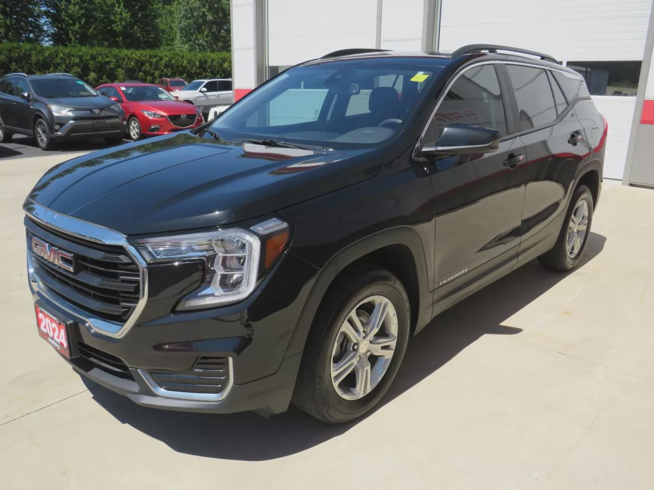 2024 GMC Terrain SLE | AWD | Automatic | Alloy Wheels | Heated Seats | Power Driver Seat | Dual Climate Control | Digital Driver Display | Android Auto & Apple CarPlay | Bluetooth | Back-Up Camera | Cruise Control | Lane Keep Assist | Lane Departure Warning | Forward Coll Photo