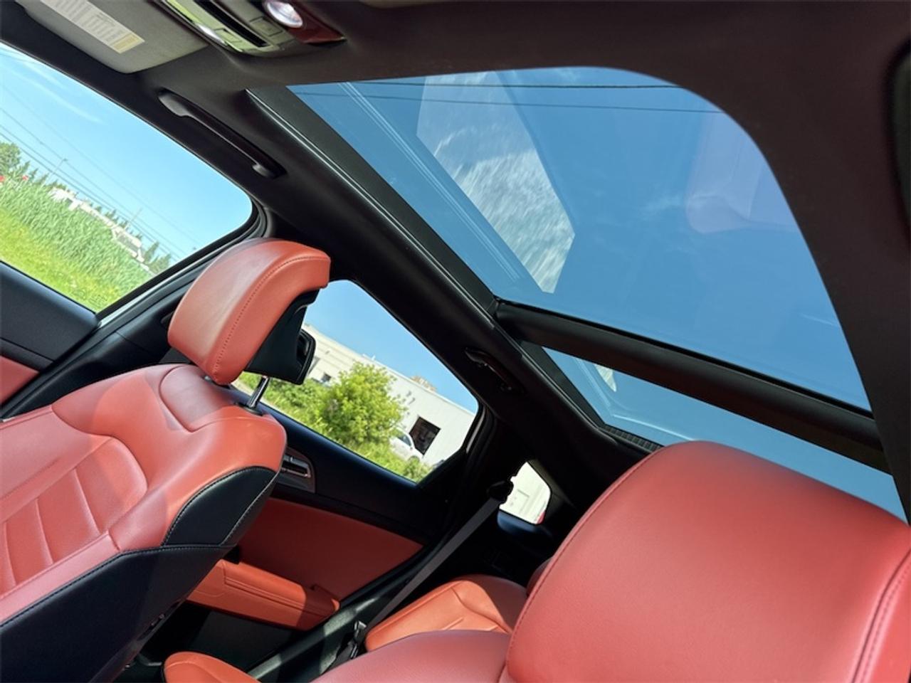 2024 Kia Sportage Hybrid SX AWD w/Red Interior   - $297 B/W Photo