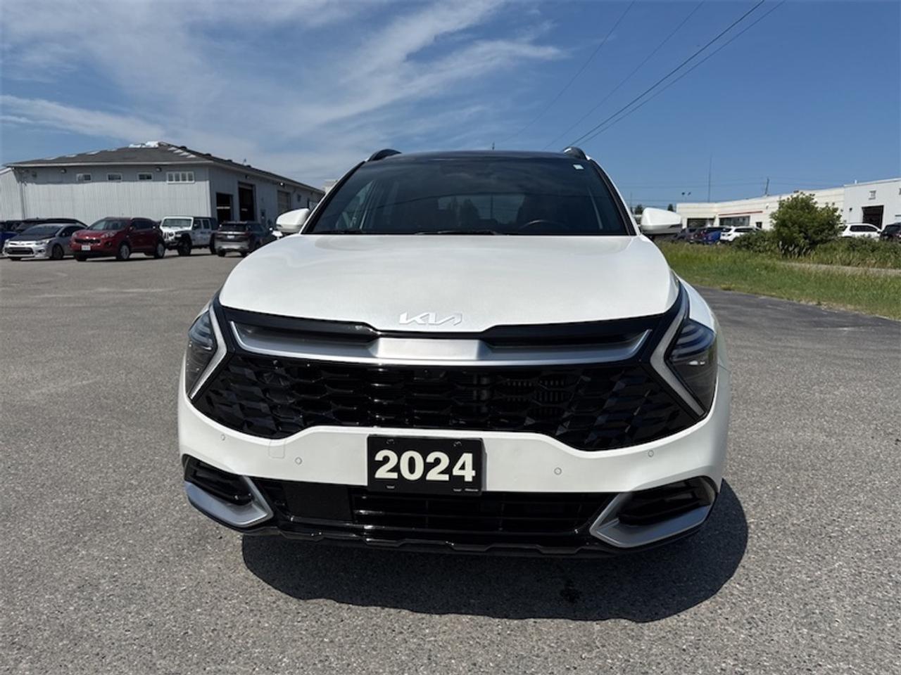2024 Kia Sportage Hybrid SX AWD w/Red Interior   - $297 B/W Photo