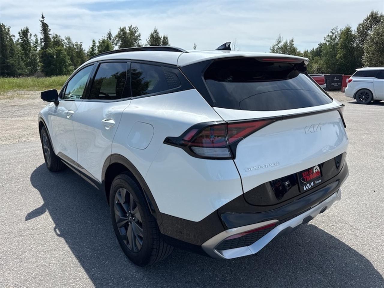 2024 Kia Sportage Hybrid SX AWD w/Red Interior   - $297 B/W Photo