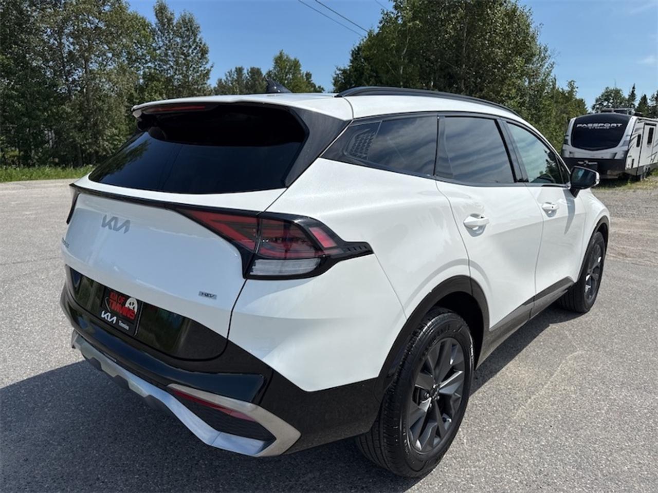 2024 Kia Sportage Hybrid SX AWD w/Red Interior   - $297 B/W Photo
