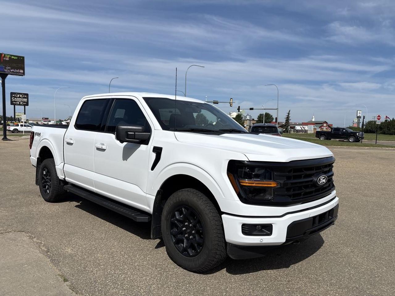THE PRICE YOU SEE, PLUS GST. GUARANTEED!APPLE CARPLAY/ANDROID AUTO COMPATABLE! 3.5 LITER ECOBOOST ENGINE, 10 SPEED AUTO, XLT TRIM(302a), BLACK SPORT CLOTH SEATS, HEATED FRONT SEATS, 60/40 FOLDING REAR BENCH, XLT BLACK APPEARANCE PKG, TRAILER BRAKE CONTROLLER, FX-4 OFF-ROAD PKG, TOW/HAUL PKG, 360 DEGREE CAMERA, BLIS, SYNC 4.       The 2025 Ford F-150 XLT with the 302A Package is a robust and well-equipped pickup truck that combines performance, style, and advanced features. Powered by a 3.5-liter EcoBoost V6 engine, it delivers impressive horsepower and torque, ensuring strong towing and hauling capabilities while maintaining a balance of fuel efficiency. The 302A Package enhances the XLT trim with a suite of premium features, including an upgraded infotainment system with a large touchscreen display, premium audio, and additional driver-assistance technologies such as blind-spot monitoring and adaptive cruise control. The Black Appearance Package adds a sleek, aggressive look to the truck, featuring blacked-out exterior accents, grille, wheels, and trim pieces, giving the vehicle a bold and commanding presence on the road. Overall, the 2025 Ford F-150 XLT with these packages offers a blend of power, modern technology, and striking aesthetics, making it a versatile choice for both work and leisure.Do you want to know more about this vehicle, CALL, CLICK OR COME ON IN!*AMVIC Licensed Dealer; CarFax and Full Mechanical Inspection Included.