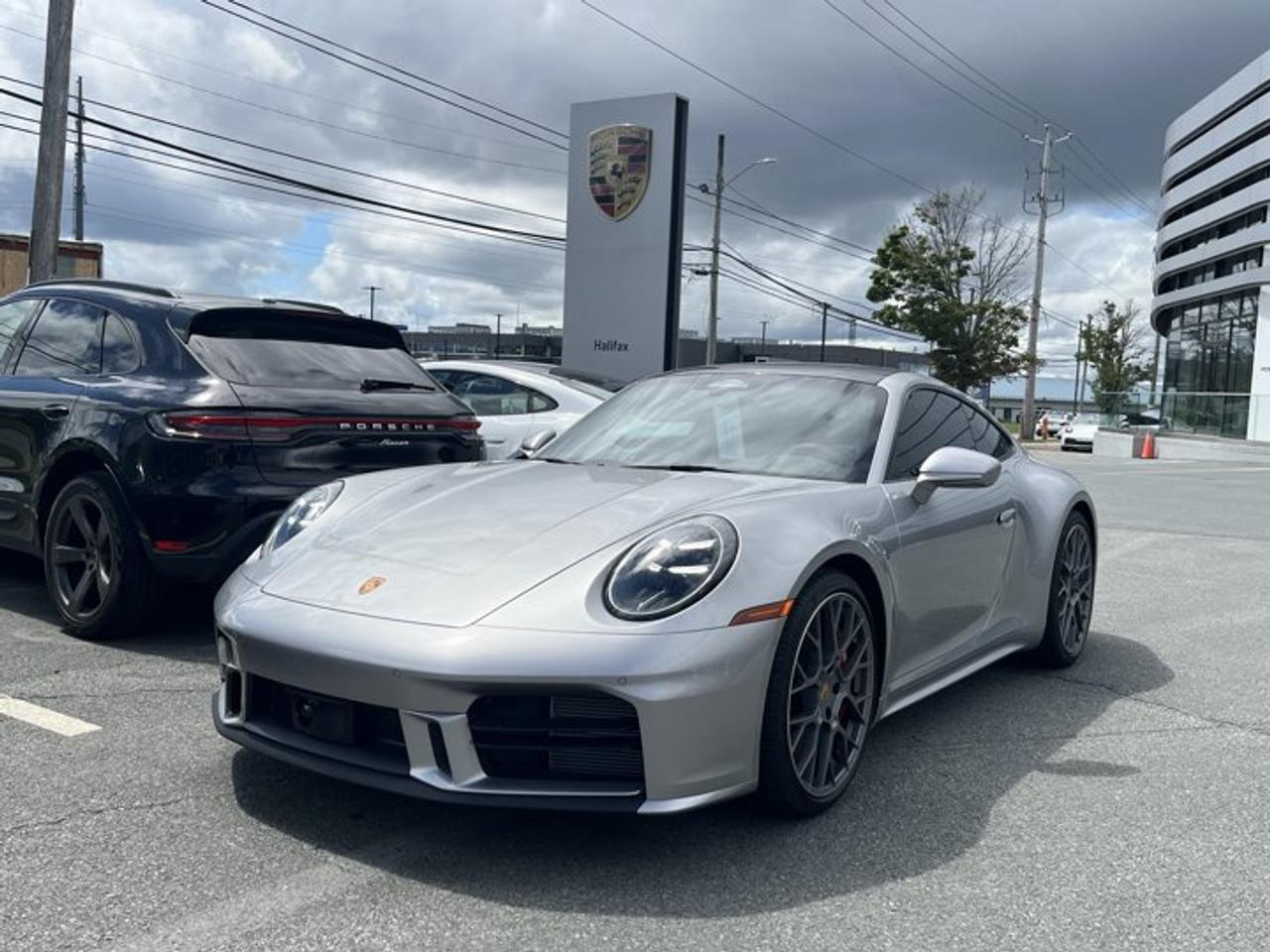 This 2026 Porsche 911 Carrera 4S, now available at Porsche Of Halifax, is finished in GT Silver Metallic with a Leather Interior in Black with Chalk stitching and is equipped with a PDK transmission.This offering is available with the CPO Designation. Unlimited Kilometer Warranty until March 2032.*Powertrain and Drivetrain*3.0-litre twin-turbocharged flat-6 engine producing 473 horsepower and 390 lb-ft of torquePDK transmissionPorsche Traction Management (PTM) all-wheel drive*Exterior*GT Silver MetallicElectric Slide/Tilt Sunroof in GlassSportDesign PackagePORSCHE Logo on Rear in High Gloss BlackModel Designation on Rear in High Gloss BlackExterior Mirror Lower Trim and Base in Exterior ColorWindow Trim in High Gloss Black20/21 RS Spyder WheelsHD-Matrix Design LED HeadlightsExclusive Design TaillightsSport Exhaust System incl. Tailpipes in BlackExclusive Design Fuel Cap in TurboniteFront Axle Lift SystemWheel Center Caps with Colored Porsche CrestUnder Door Puddle Light Projectors*Interior and Seating*Leather Interior in Black with Chalk StitchingPower Sport Seats (14-way) with Memory PackageVentilated Seats (Front)Heated GT Sport Steering Wheel in Leather930 Leather PackageRear SeatsSport Chrono Stopwatch and Digital Tachometer in WhiteInterior Trim Inlays in Matte Carbon Fiber and Trim in BlackPorsche Crest on Headrests (Front)Center Console Lid with Model DesignationIonizerStorage Net in Passenger Footwell*Technology and Driver Assistance*BOSE® Surround Sound SystemSurround View with Active Parking SupportLane Change Assist (LCA)Adaptive Cruise Control (ACC)Sport Chrono PackagePower Steering PlusThis 911 Carrera 4S is configured with a twin-turbocharged all-wheel-drive powertrain, advanced chassis systems, and a combination of comfort, technology, and driver assistance features suitable for everyday driving.Visit www.porscheofhalifax.com or call (902)453-8800 to speak with a Porsche Sales Executive.