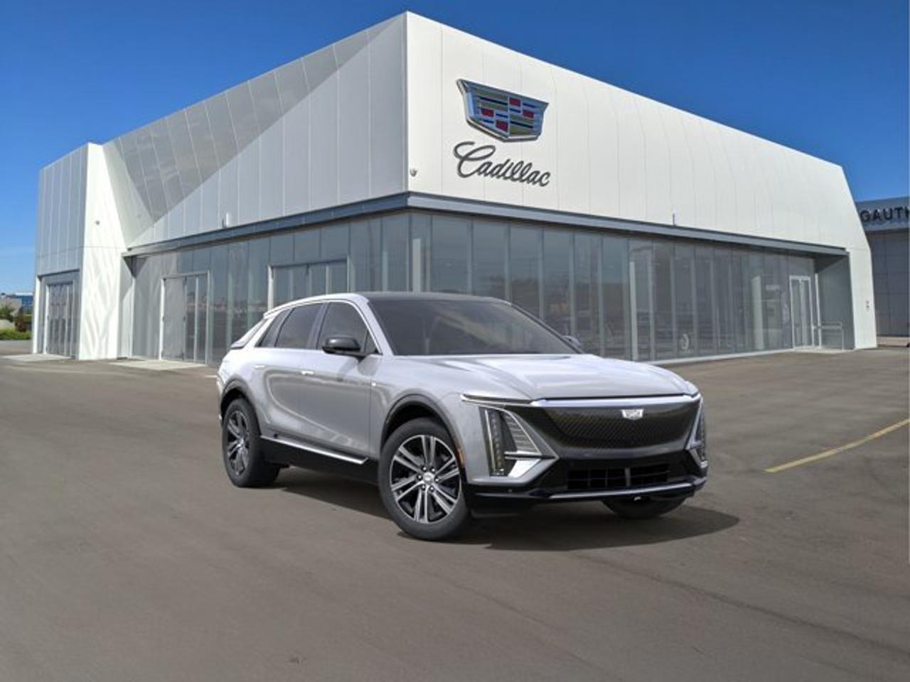 The Cadillac LYRIQ Luxury is a premium all-electric SUV that combines sophisticated styling, impressive range, and advanced technology. It features a single-motor rear-wheel-drive powertrain with up to 525 kilometres of estimated range, while ll-wheel drive adds dual-motor performance. Inside, the LYRIQ Luxury offers Inteluxe seating, heated front seats, a heated steering wheel, 126-colour ambient lighting, and a panoramic fixed glass roof with power shade. Technology highlights include a 33-inch advanced LED display, Google built-in compatibility, wireless Apple CarPlay and Android Auto, wireless phone charging, and standard Super Cruise hands-free driver assistance. With 190-kW DC fast charging, distinctive LED lighting, 20-inch alloy wheels, and a comprehensive suite of safety features, the LYRIQ Luxury delivers a refined and modern electric-driving experience.