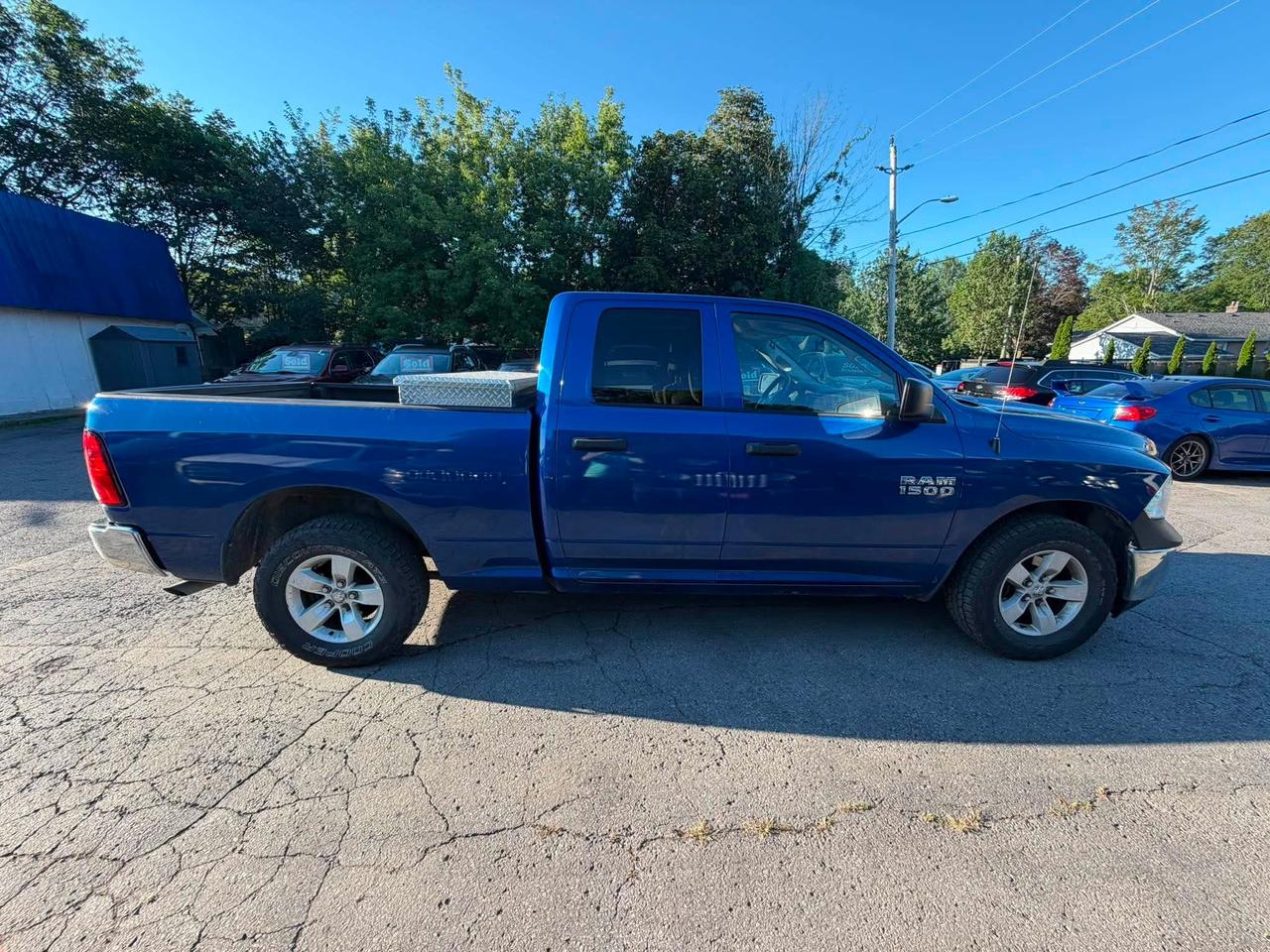 2016 RAM 1500 2WD QUAD CAB 140.5" ST Photo