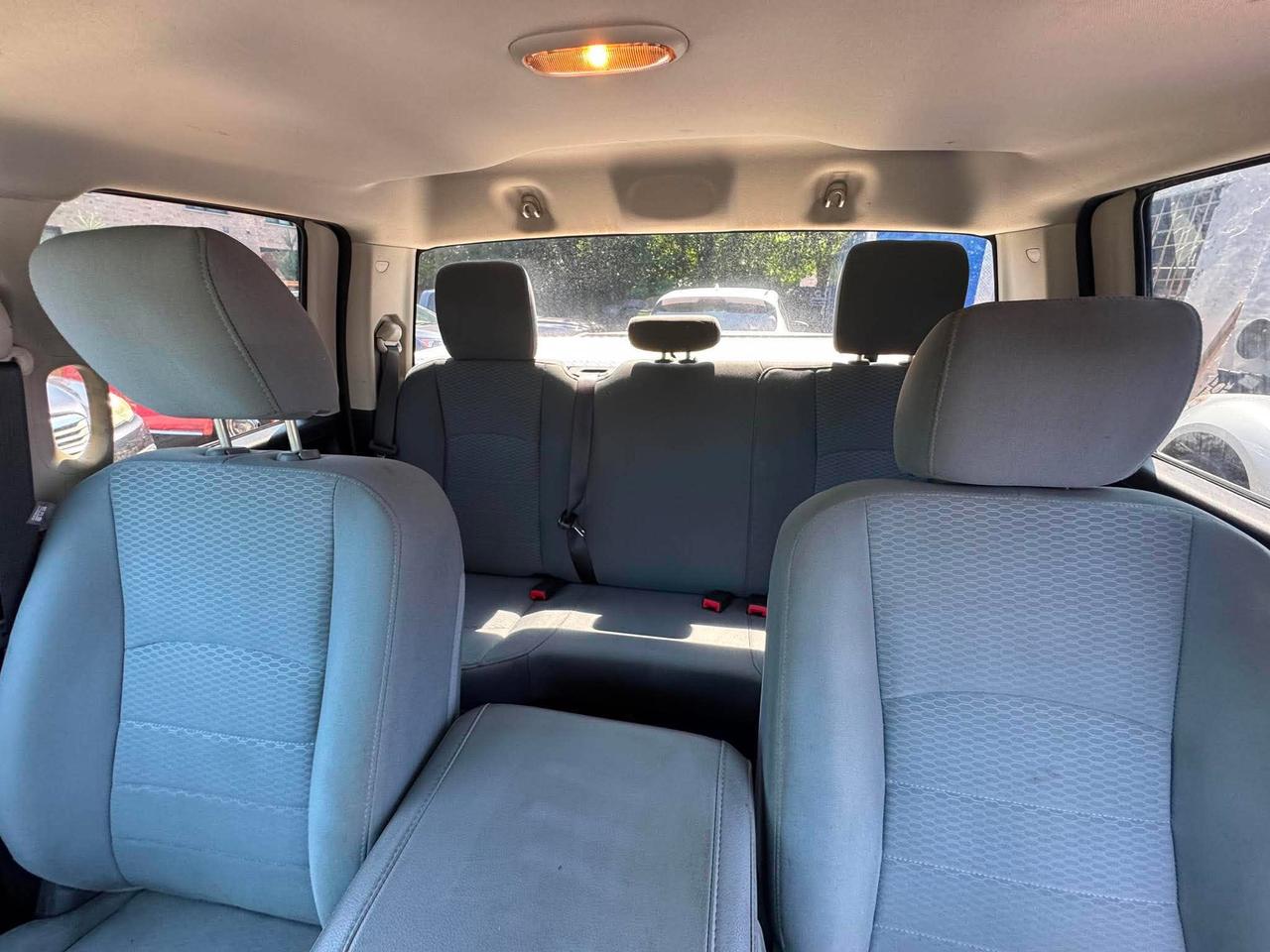 2016 RAM 1500 2WD QUAD CAB 140.5" ST Photo