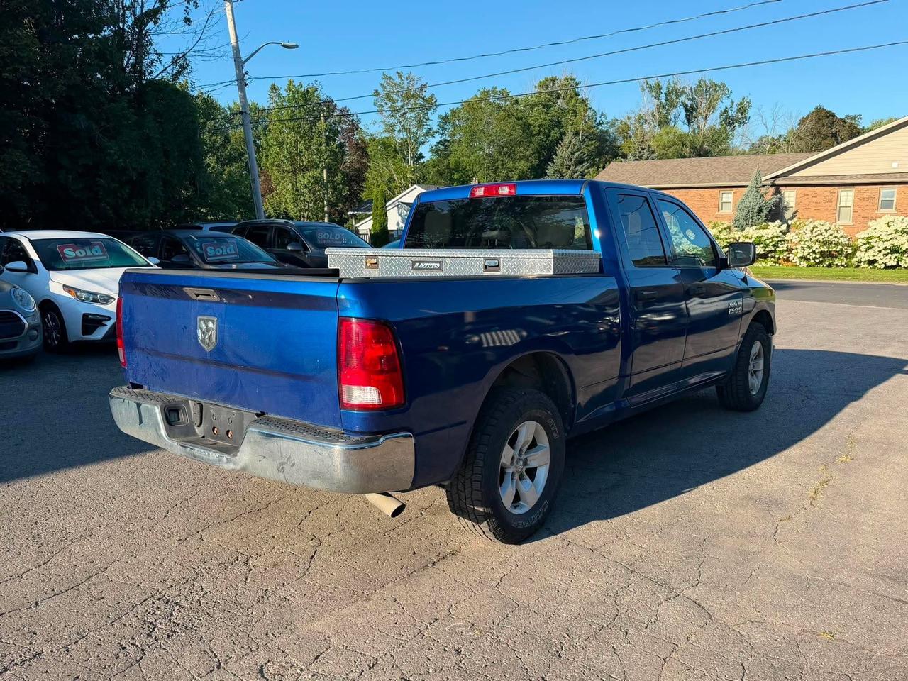 2016 RAM 1500 2WD QUAD CAB 140.5" ST Photo