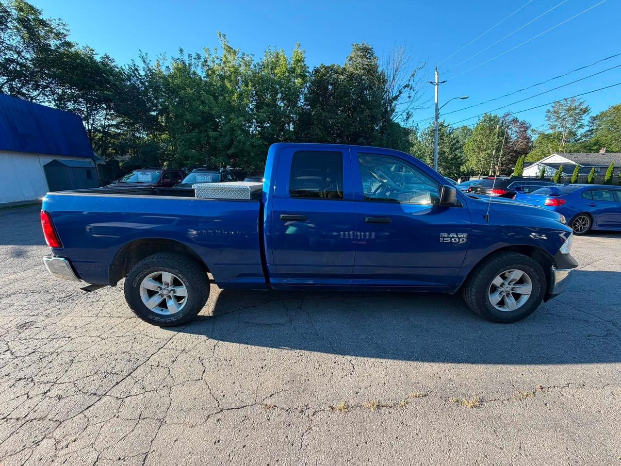 2016 RAM 1500 2WD QUAD CAB 140.5" ST Photo