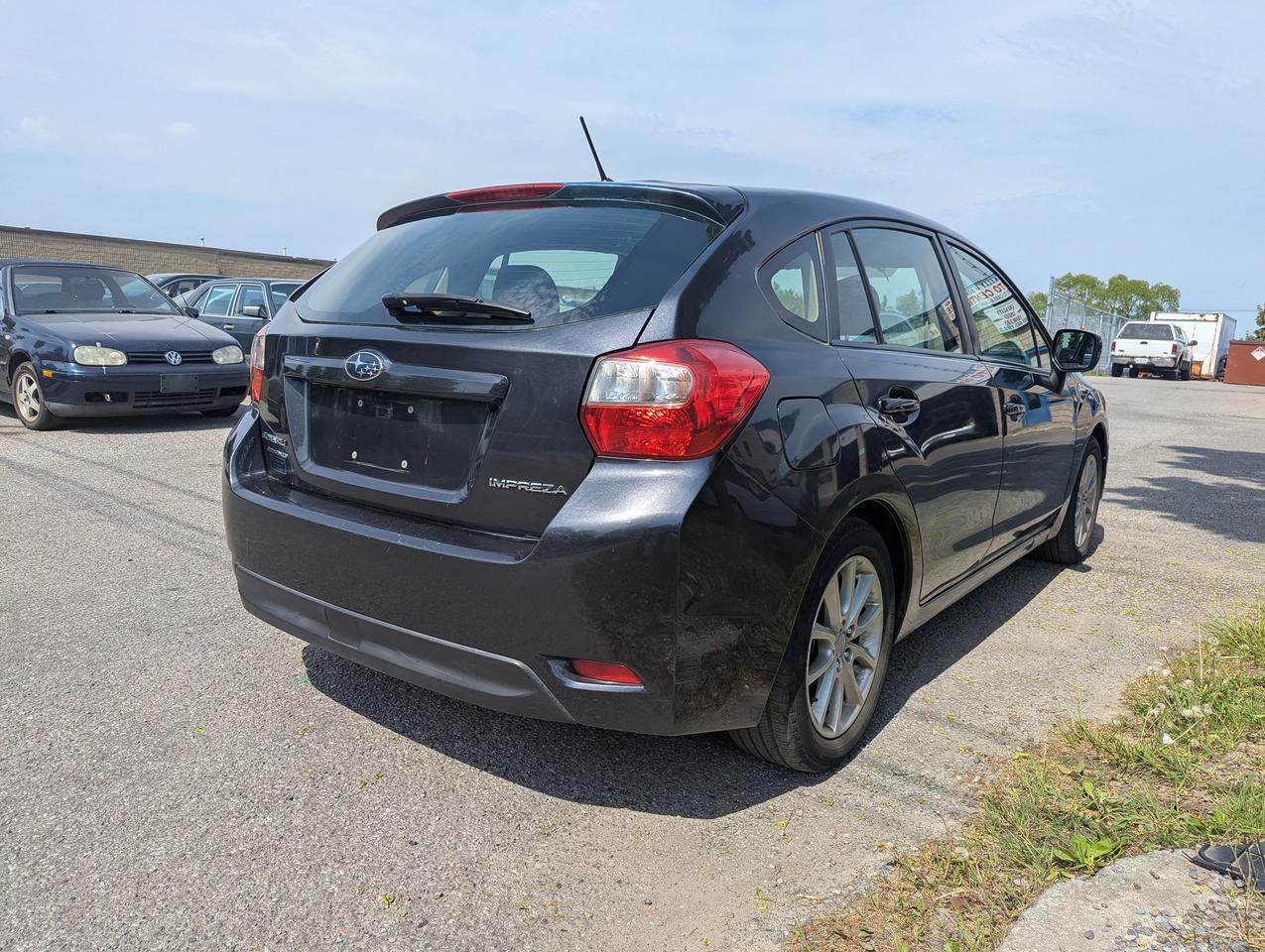 2013 Subaru Impreza "4x4 Gas MISER" certified + FREE 6M warranty Photo