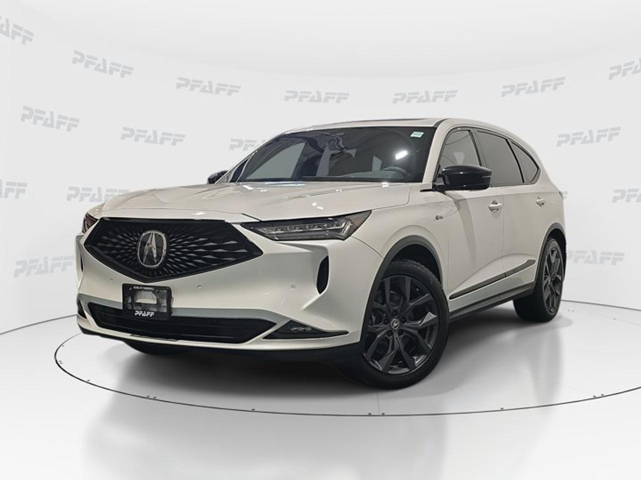 **The online price includes a $1000 financing credit. For cash purchases, an additional $1000 dollars will be added to the price.** This disclosure applied to pre-owned inventory only: The online price includes a $1000 financing credit. For cash purchases, an additional $1000 dollars will be added to the price.*Experience premium Acura performance and everyday versatility in this 2023 Acura MDX A-Spec, now available at Acura of Thornhill in Thornhill. With 80,200 km, a clean white exterior, four doors, and automatic transmission, this used SUV blends athletic design, confident road manners, and upscale comfort for families and drivers who want more from every trip.Finished in white, this 2023 Acura MDX A-Spec presents a bold and refined look that suits both city streets and highway travel. Inside, the cabin offers a welcoming layout with supportive seating, thoughtful storage, and easy-to-use controls. This Acura SUV is well equipped with popular features that add comfort, convenience, and peace of mind every day.FEATURES OF THE MDX A-SpecSport-focused styling with bold exterior detailsSuperbly tuned chassis for confident handlingDistinctive cabin design with premium touchesAthletic character with everyday family versatilityADVANCED SAFETY FEATURESAnti-Lock Braking System for controlled stopsStability Control helps maintain vehicle balanceBlind Spot Monitor adds lane-change awarenessCross-Traffic Alert assists while reversingPERFORMANCE AND EFFICIENCYAutomatic transmission delivers smooth power responsePower Steering supports easy daily manoeuvresLimited Slip Differential aids traction controlAdaptive Cruise Control supports relaxed highway drivingCOMFORT AND CONVENIENCEHeated front seats add cold-weather comfortHeated steering wheel feels great in winterMemory seats help save preferred positionsPower liftgate simplifies loading and unloadingTECHNOLOGY AND CONNECTIVITYBluetooth Integration supports hands-free phone useSmart Device Integration keeps apps accessibleWiFi Hotspot helps passengers stay connectedSteering wheel audio controls ease operationCARGO SPACEPower liftgate improves everyday cargo accessFour-door layout supports easy loading convenienceRear spoiler complements practical SUV designFlexible cabin suits errands and travelAWARDS & RECOGNITIONSTop Safety Pick+, Insurance Institute for Highway Safety, 2023WHAT OTHER OWNERS LIKEConfident handling and composed highway rideUser-friendly technology for daily driving easeComfortable seating and premium cabin feelStrong safety features for family confidenceThis 2023 Acura MDX A-Spec is equipped with many sought-after features that help make every drive more enjoyable. Highlights include Cruise Control, Power Steering, Anti-Lock Braking System, Stability Control, Traction Control, Child Safety Locks, Heated Mirrors, Power Windows, Front Air Conditioning, leather seats, Heated Seats, Memory Seats, Adjustable Steering Wheel, Satellite Radio, Backup Camera, Automatic Headlights, Rain-Sensing Windshield Wipers, Fog Lights, Tire Pressure Monitoring, HD Radio, Auto-Dimming Rearview Mirror, Turn Signal Mirrors, Aluminum Wheels, Keyless Entry, and more.This Acura SUV is an excellent choice for drivers who want luxury, utility, and advanced driver assistance in one well-rounded package. Features such as Lane Departure Warning, Blind Spot Monitor, Cross-Traffic Alert, Adaptive Cruise Control, and a Backup Camera help support confidence behind the wheel, while comfort items like Heated Front Seats, a Heated Steering Wheel, and Memory Seats add a premium touch to daily use.At Acura of Thornhill, this 2023 Acura MDX A-Spec stands out as a smart option for drivers shopping for a used luxury SUV with proven appeal, advanced safety, and strong everyday usability. If you want a vehicle that feels refined, practical, and rewarding to drive, this Acura deserves a closer look.This 2023 Acura MDX A-Specs VIN is: 5J8YE1H03PL800199 .