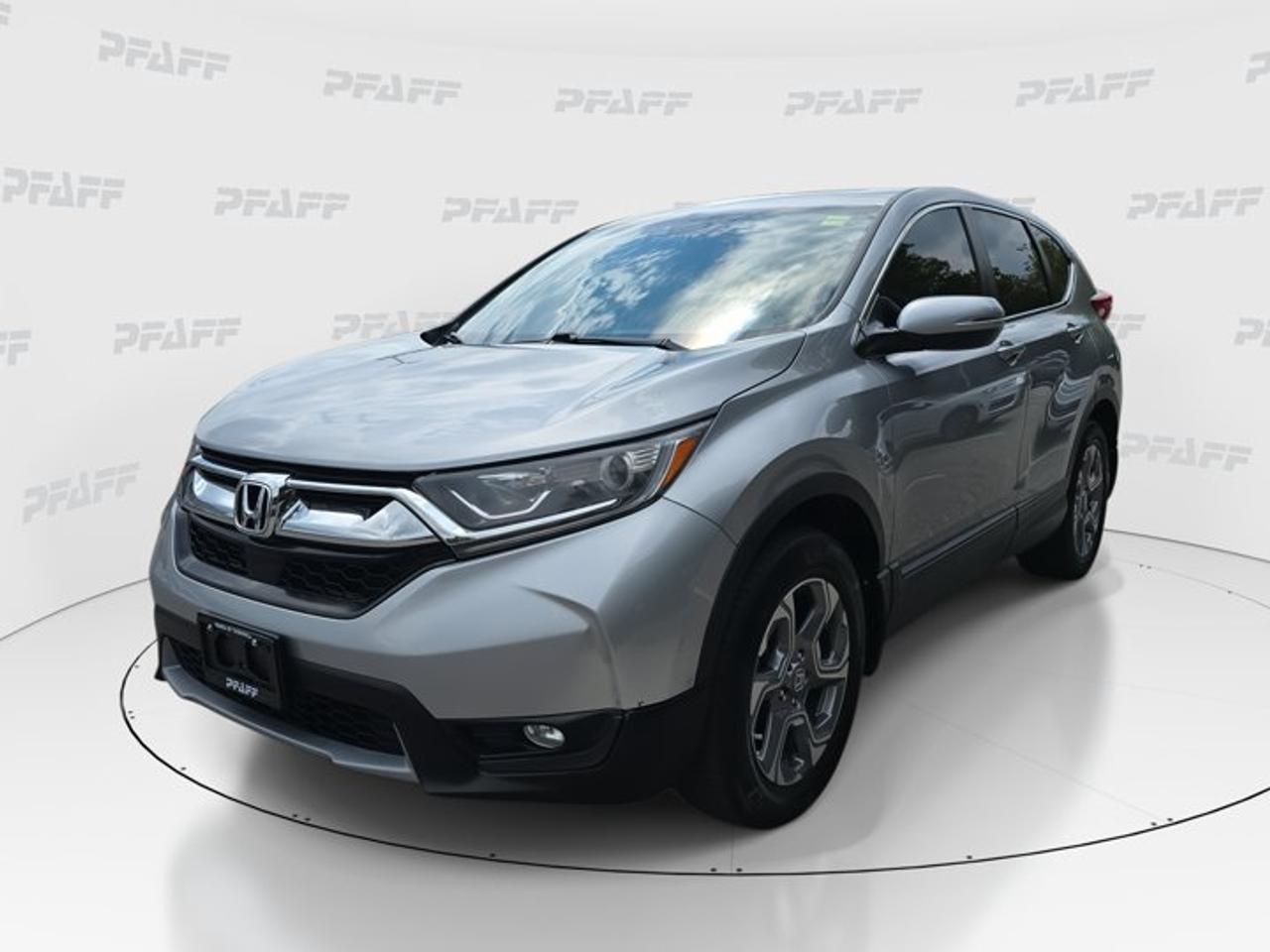 ** This disclosure applied to pre-owned inventory only: The online price includes a $1000 financing credit. For cash purchases, an additional $1000 dollars will be added to the price.*Discover smart value and everyday confidence in this used 2019 Honda CR-V EX at Honda of Thornhill in Thornhill. Finished in Silver with a Black interior, this four-door SUV blends practical comfort, trusted Honda engineering, and the versatile utility drivers want for busy daily life. With 192,311 km, it stands ready to keep delivering dependable performance.The 2019 Honda CR-V EX is known for its roomy cabin, easy driving feel, and well-balanced feature set. This example comes equipped with key convenience and safety items that matter most, including adaptive cruise control, lane departure warning, a backup camera, heated front seats, remote starter, and Bluetooth integration for a connected drive.FEATURES OF THE CR-V EXRemote starter adds cold-weather convenienceHeated front seats for winter comfortBackup camera helps with reversingAdaptive cruise control supports highway drivingADVANCED SAFETY FEATURESAnti-Lock Braking System adds braking controlStability control helps maintain vehicle balanceTraction control supports slippery road gripChild safety locks add family peacePERFORMANCE AND EFFICIENCYAutomatic transmission delivers smooth daily drivingPower steering supports easy city handlingCruise control helps on longer tripsAluminum wheels add confident road presenceCOMFORT AND CONVENIENCEHeated mirrors help in winter weatherPower windows add everyday easeFront air conditioning keeps cabin comfortableAdjustable steering wheel improves driver fitTECHNOLOGY AND CONNECTIVITYBluetooth integration supports hands-free communicationSmart device integration keeps tech accessibleSteering wheel audio controls reduce distractionAutomatic headlights add simple daily convenienceCARGO SPACEFour-door access helps passenger entryRear spoiler adds sporty utility appealSUV design supports flexible daily haulingCabin layout suits errands and travelAWARDS & RECOGNITIONSTop Safety Pick, Insurance Institute for Highway Safety, 2019Best Compact Utility Vehicle, Automobile Journalists Association of Canada, 2019WHAT OTHER OWNERS LIKEComfortable ride quality for daily commutingUseful driver-assist features on highwaysStrong cargo versatility for active lifestylesEasy controls and practical interior layoutThis used 2019 Honda CR-V EX is a great fit for drivers who want proven Honda practicality with the features they use every day. The Silver exterior gives it a clean, timeless look, while the Black interior offers a neat and functional space for commuting, shopping, and weekend plans.At Honda of Thornhill, this 2019 Honda CR-V EX offers a confident mix of comfort, convenience, and trusted utility. Features such as fog lights, turn signal mirrors, keyless entry, tire pressure monitoring, and lane departure warning help round out a well-equipped SUV designed to make every drive easier and more reassuring.This 2019 Honda CR-V EXs VIN is: 2HKRW2H53KH134699 .