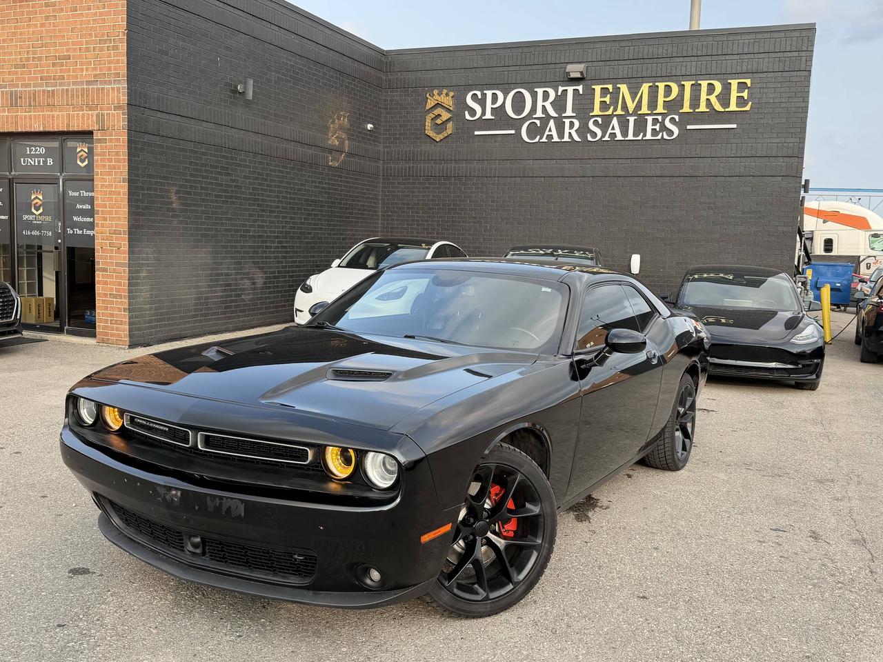 *FULLY LOADED* *SXT* *HEATED SEATS* *AUTOMATIC* *BLIND SPOT MONITORING* *REVERSE CAMERA* Safety Certificate NOT included in the price | SAFETY: $699 Year :2020 Make: Dodge Model: Challenger Trim: SXT Kms: 103,210KM Finance Price: $20,880 Cash Price: $21,880 Sport Empire Cars, offering a beautiful Dodge Challenger SXT with ONLY 103,210 kms!! For the affordable price of $20,880+HST and licensing. Beautiful black exterior with a black leather interior. Professionally detailed and ready to go. Perfect combination of reliability, comfort and luxury. Buy with Trust with an Ontario registered dealer. Please note: The listed price is a finance-only special. If you wish to purchase the vehicle with cash, a $1,000 premium will be added to the sale price. ** In accordance with OMVIC regulations, please be advised that the vehicle being offered is not currently certified, e-tested or drivable. Certification is available for an additional fee starting from $699. With our safety package the vehicle comes with a 36 day safety standard warranty, complimentary oil change and inspection report