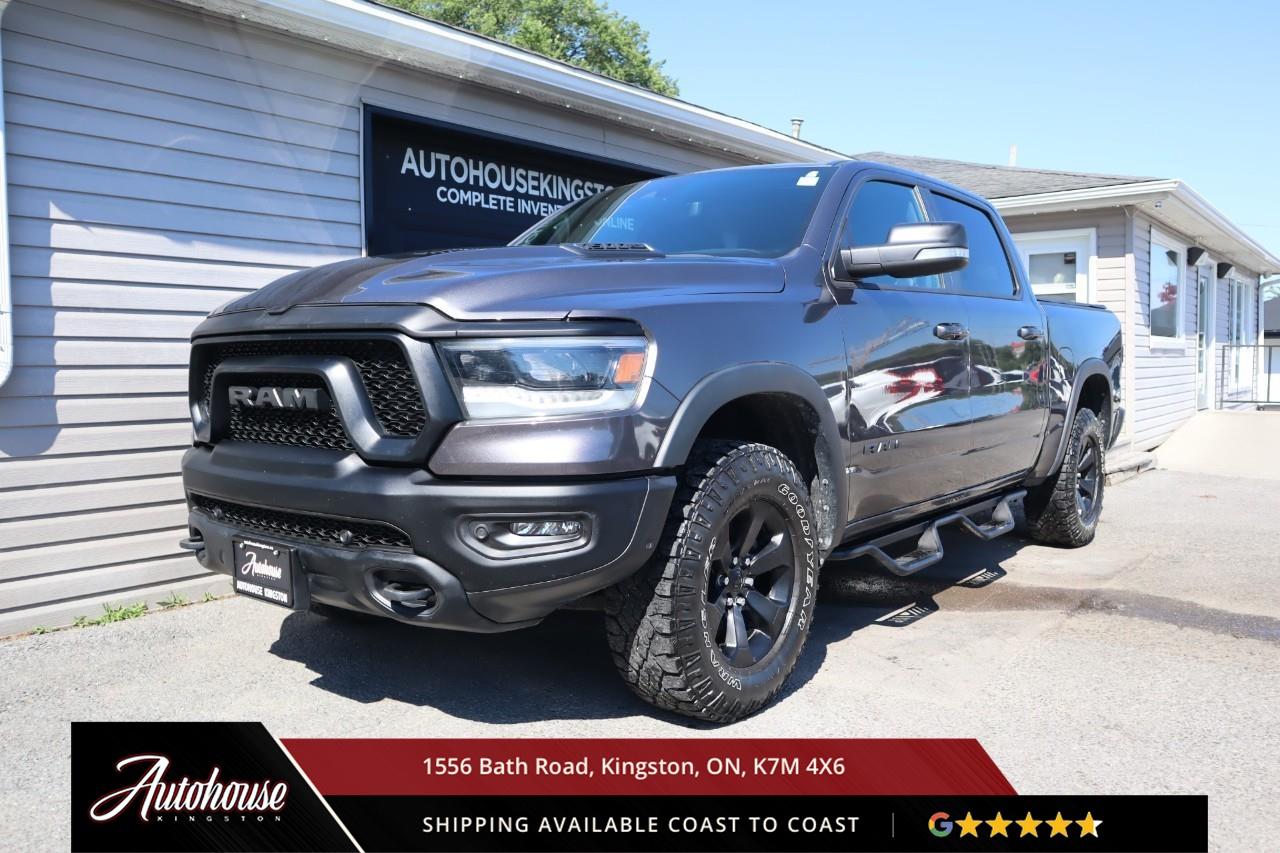 <p><strong>2022 Ram 1500 Rebel</strong><span style=color:rgba( 0 , 0 , 0 , 0.9 )>  Off-road dominance meets premium capability in this full-size pickup, featuring a 5.7-liter HEMI V8 with eTorque mild hybrid technology delivering 395 horsepower and 410 lb-ft of torque through an 8-speed automatic transmission with 4x4 and Selec-Speed Control, achieving <strong>an estimated 15.8 L/100km city and 11.1 L/100km highway fuel efficiency. </strong>The Rebel trim distinguishes itself with aggressive off-road styling including blacked-out grille with RAM lettering, powder-coated front and rear bumpers, LED headlights with fog lamps, sport hood, tow hooks, and 18-inch black aluminum wheels with 33-inch Goodyear Wrangler DuraTrac all-terrain tires. Inside the rugged yet refined cabin, premium vinyl and cloth seating includes heated 8-way power front seats with driver memory, heated leather-wrapped steering wheel, dual-zone automatic climate control, and Uconnect 5 touchscreen with Apple CarPlay, Android Auto, Bluetooth streaming, and a 6-speaker audio system. Off-road capability features include Bilstein monotube shocks, electronic locking rear differential, hill descent control, and raised suspension for improved approach and departure angles. Additional features include keyless entry with push-button start, remote engine start, 1,043-kilogram payload capacity, and 5,783-kilogram towing capacity. This Ram 1500 Rebel delivers commanding V8 power, exceptional off-road prowess, and Ram's legendary capability for Canadian adventurers seeking rugged performance without compromise. Clean CARFAX available.</span></p>