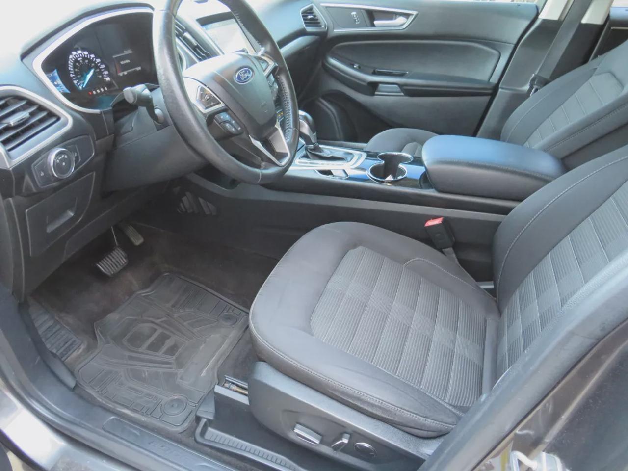 2016 Ford Edge SEL | AWD | Automatic | Alloy Wheels | Panoramic Sunroof | Heated Steering Wheel | Dual Climate Control | Touchscreen Display | Navigation | Bluetooth | Back-Up Camera | Rear Park Assist | Cruise Control | Remote Start | Trailer Tow Package Photo