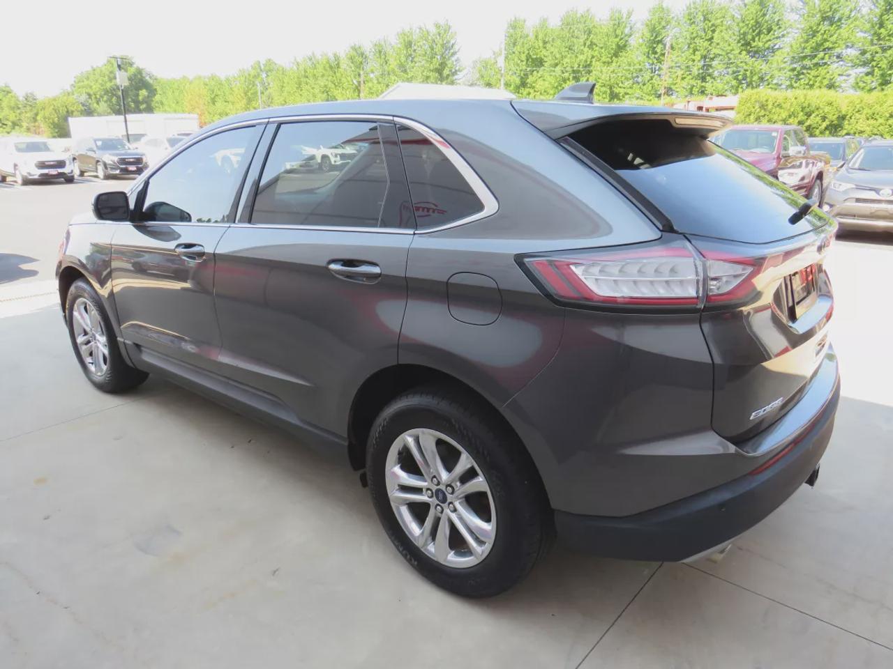 2016 Ford Edge SEL | AWD | Automatic | Alloy Wheels | Panoramic Sunroof | Heated Steering Wheel | Dual Climate Control | Touchscreen Display | Navigation | Bluetooth | Back-Up Camera | Rear Park Assist | Cruise Control | Remote Start | Trailer Tow Package Photo