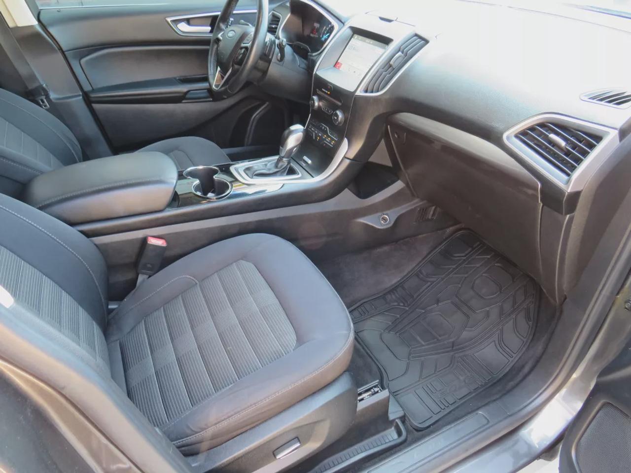 2016 Ford Edge SEL | AWD | Automatic | Alloy Wheels | Panoramic Sunroof | Heated Steering Wheel | Dual Climate Control | Touchscreen Display | Navigation | Bluetooth | Back-Up Camera | Rear Park Assist | Cruise Control | Remote Start | Trailer Tow Package Photo