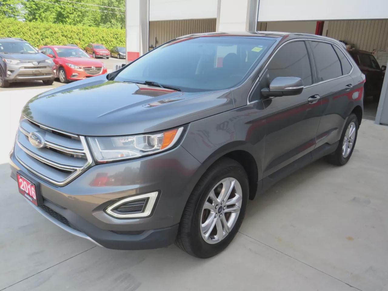 2016 Ford Edge SEL | AWD | Automatic | Alloy Wheels | Panoramic Sunroof | Heated Steering Wheel | Dual Climate Control | Touchscreen Display | Navigation | Bluetooth | Back-Up Camera | Rear Park Assist | Cruise Control | Remote Start | Trailer Tow Package Photo
