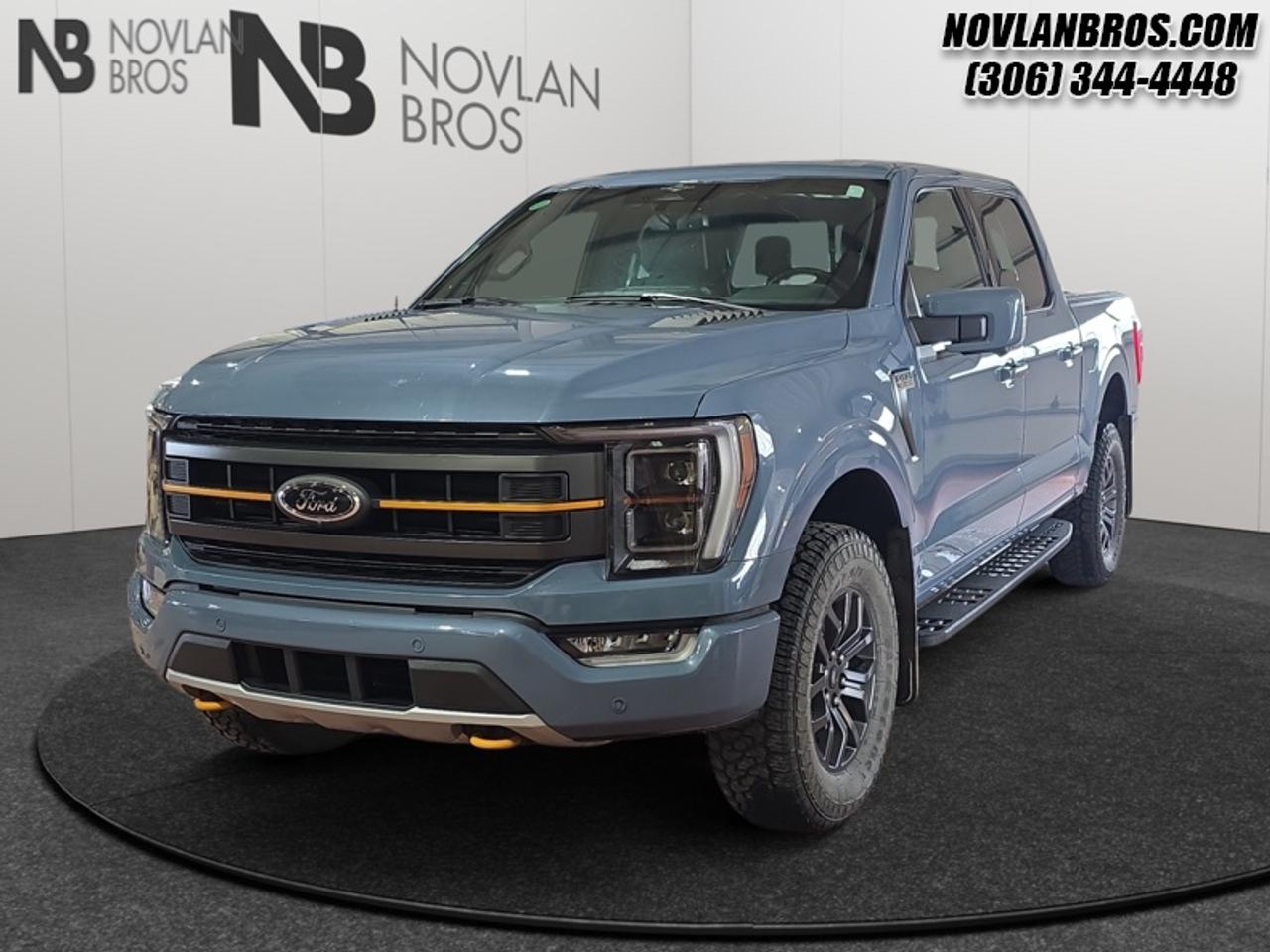 <b>Heated Seats, Navigation, Alloy Wheels, Remote Engine Start, Rear View Camera!</b><br> <br> Check out our great inventory of pre-owned vehicles at Novlan Brothers!<br> <br>The Ford F-150 is for those who think a day off is just an opportunity to get more done. This 2023 Ford F-150 is fresh on our lot in Paradise Hill.<br> <br>The perfect truck for work or play, this versatile Ford F-150 gives you the power you need, the features you want, and the style you crave! With high-strength, military-grade aluminum construction, this F-150 cuts the weight without sacrificing toughness. The interior design is first class, with simple to read text, easy to push buttons and plenty of outward visibility. With productivity at the forefront of design, the F-150 makes use of every single component was built to get the job done right!<br> <br>This Crew Cab 4X4 pickup has 90,722 km. Its Azure Grey Met Tri-coat in colour and is completely accident free based on the <a href=https://vhr.carfax.ca/?id=NAEevpf2l0LqiLN116834/n1w4IHtVcQ target=_blank>CARFAX Report</a>. It has a 10 Speed Automatic transmission and is powered by a 400HP 3.5L V6 Cylinder Engine. <br> <br> Our F-150s trim level is Tremor. Upgrading to this Ford F-150 Tremor is a great choice as it comes loaded with exclusive aluminum wheels, a performance off-road suspension, a dual stainless steel exhaust with black tip, front fog lights, remote keyless entry and remote engine start, Ford Co-Pilot360 that features lane keep assist, pre-collision assist and automatic emergency braking. Enhanced features include body colored exterior accents, SYNC 4 with enhanced voice recognition, Apple CarPlay and Android Auto, FordPass Connect 4G LTE, steering wheel mounted cruise control, a powerful audio system, trailer hitch and sway control, cargo box lights, power door locks and a rear view camera to help when backing out of a tight spot. This vehicle has been upgraded with the following features: Heated Seats, Navigation, Alloy Wheels, Remote Engine Start, Rear View Camera, Reverse Sense System, Bucket Seats.<br> To view the original window sticker for this vehicle view this <a href=http://www.windowsticker.forddirect.com/windowsticker.pdf?vin=1FTEW1E85PFD01069 target=_blank>http://www.windowsticker.forddirect.com/windowsticker.pdf?vin=1FTEW1E85PFD01069</a>. <br/><br> <br>To apply right now for financing use this link: <a href=http://novlanbros.com/credit/ target=_blank>http://novlanbros.com/credit/</a><br> <br/><br>The Novlan family is owned and operated by a third generation and committed to the values inherent from our humble beginnings.<br> Come by and check out our fleet of 20+ used cars and trucks and 100+ new cars and trucks for sale in Paradise Hill.  o~o