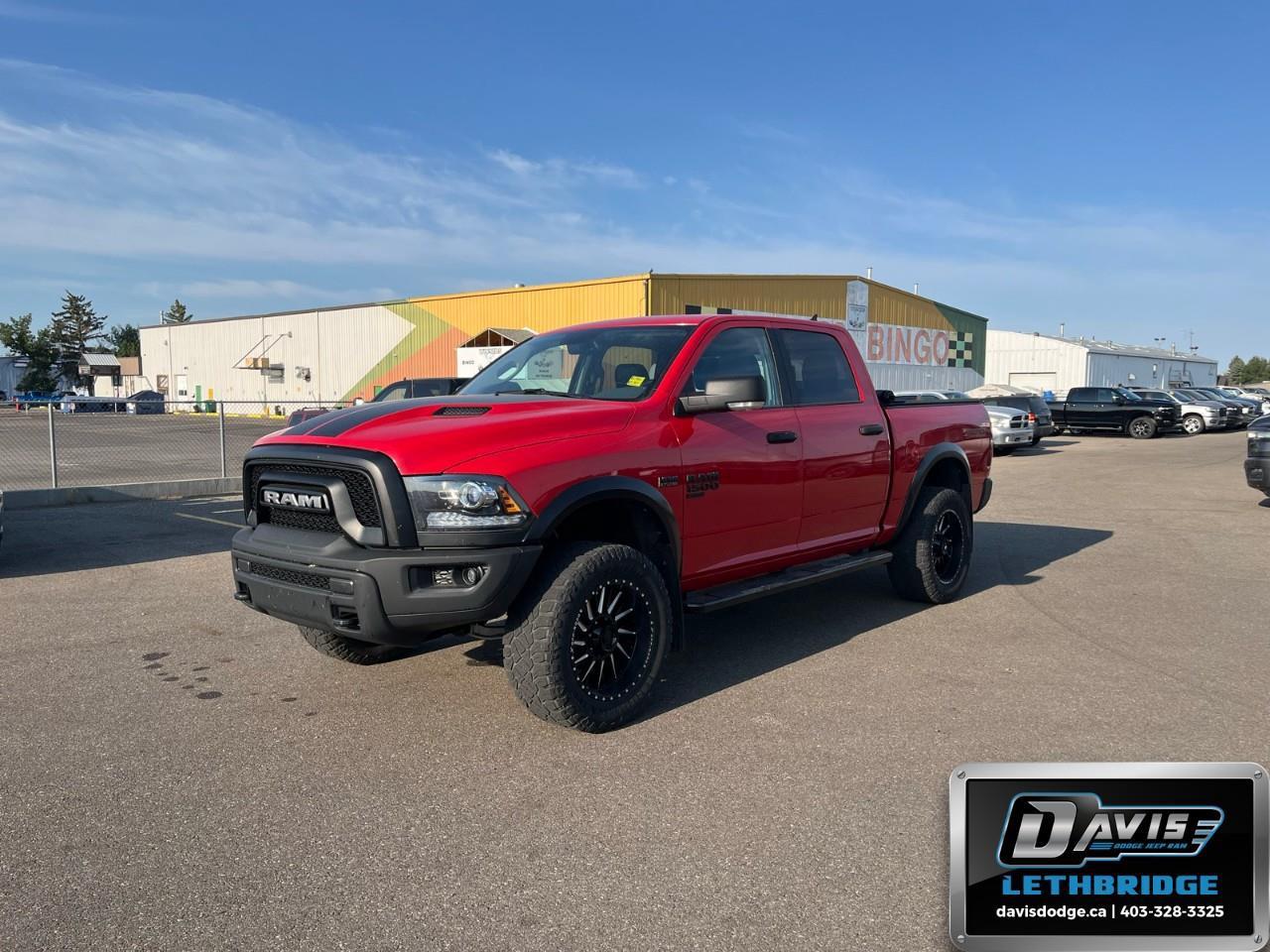 <p>Introducing the stunning 2020 Ram 1500 Classic Warlock, presented in a vibrant red exterior with a rugged 4x4 drivetrain. This truck is designed to handle any terrain with strength and agility.</p><p><strong>Exterior Features:</strong></p><ul><li>Aluminum Wheels</li><li>Heated Mirrors</li><li>5'7" Box</li></ul><p><strong>Interior Features:</strong></p><ul><li>Gray Interior</li><li>Air Conditioning</li><li>Cruise Control</li><li>Keyless Entry</li><li>Power Windows</li></ul><p><strong>Technology & Safety Features:</strong></p><ul><li>Backup Camera</li><li>Bluetooth Connection</li><li>Brake Assist</li><li>Parking Sensors</li><li>Satellite Radio</li></ul><p>The Ram 1500 Classic Warlock is perfect for those who seek adventure without compromising comfort and technology. Whether you're navigating city streets or exploring unpaved paths, this vehicle is ready for it all. Reach out to Davis Dodge Lethbridge for more details and experience the power and features of this remarkable truck today!</p>