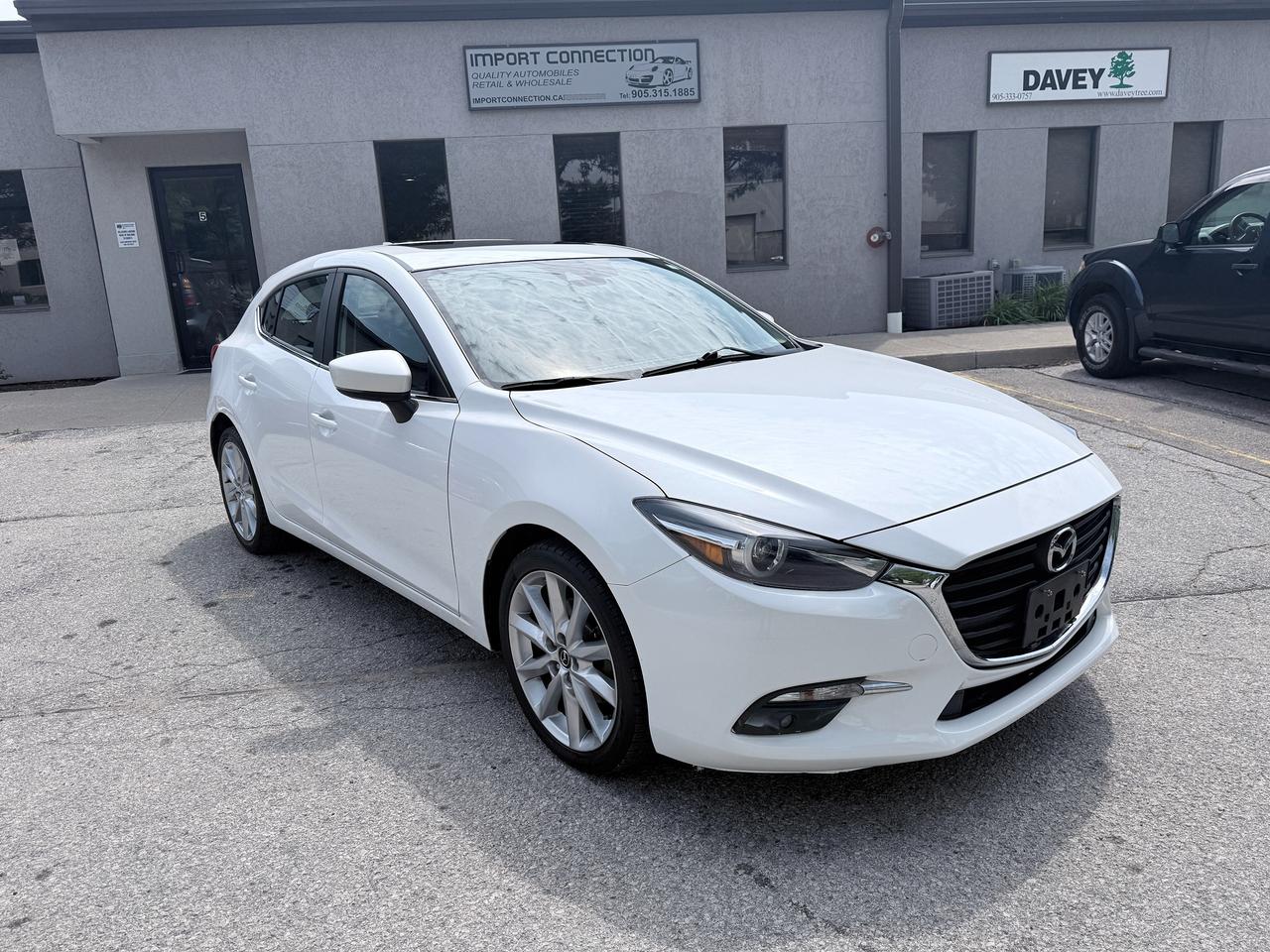 <p>2018 MAZDA3 GT HB..LOW MILEAGE !!..ONE OWNER..NO ACCIDENTS..CERTIFIED!!</p><p>POWER SUNROOF..PUSH BUTTON START..REAR VIEW CAMERA..BLUETOOTH..NAVIGATION READY..CLIMATE CONTROL..HEATED STEERING WHEEL...HEATED SEATS and MIRRORS..TINTED GLASS...18 ALLOY RIMS..CERTIFIED and much more !!</p><p>FINANCING IS AVAILABLE !..</p><p>SAFETY CERTIFICATION and CARFAX REPORT ARE INCLUDED...FINANCING IS AVAILABLE !</p><p>HST and &nbsp;LICENSING is EXTRA</p><p>We are an OMVIC licensed car dealer,24 Years in business and a 20 Year member of the Used Car Dealers Association.Extended Vehicle Warranties &nbsp;are available.</p><p>Office : 9-0-5-3-1-5 1-8-8-5</p><p>WEB:www.importconnection.ca</p>